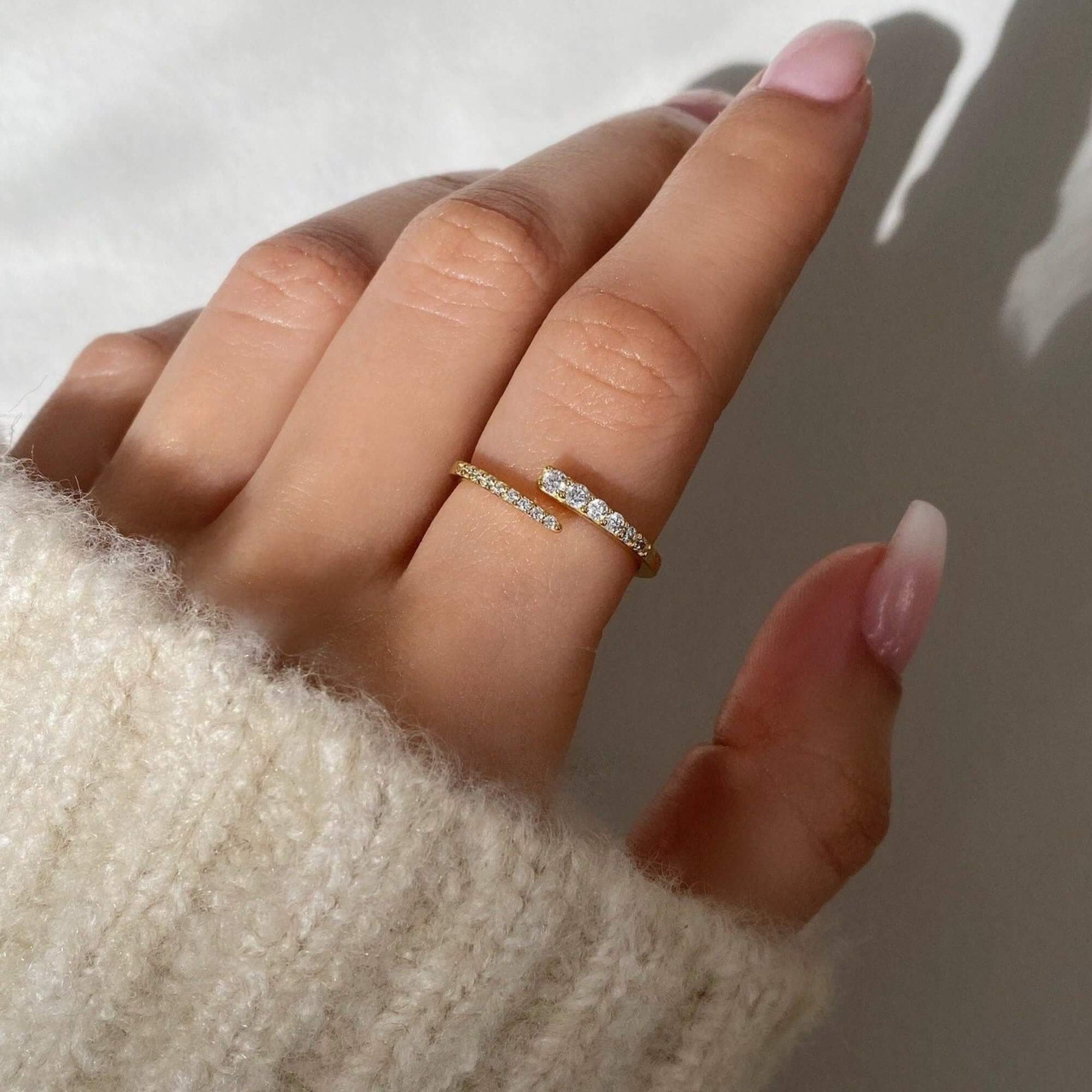 Angled view of the KimikoR 14K gold-plated wrap ring by Kampy Designs, showcasing its modern, adjustable design and elegant gold finish.