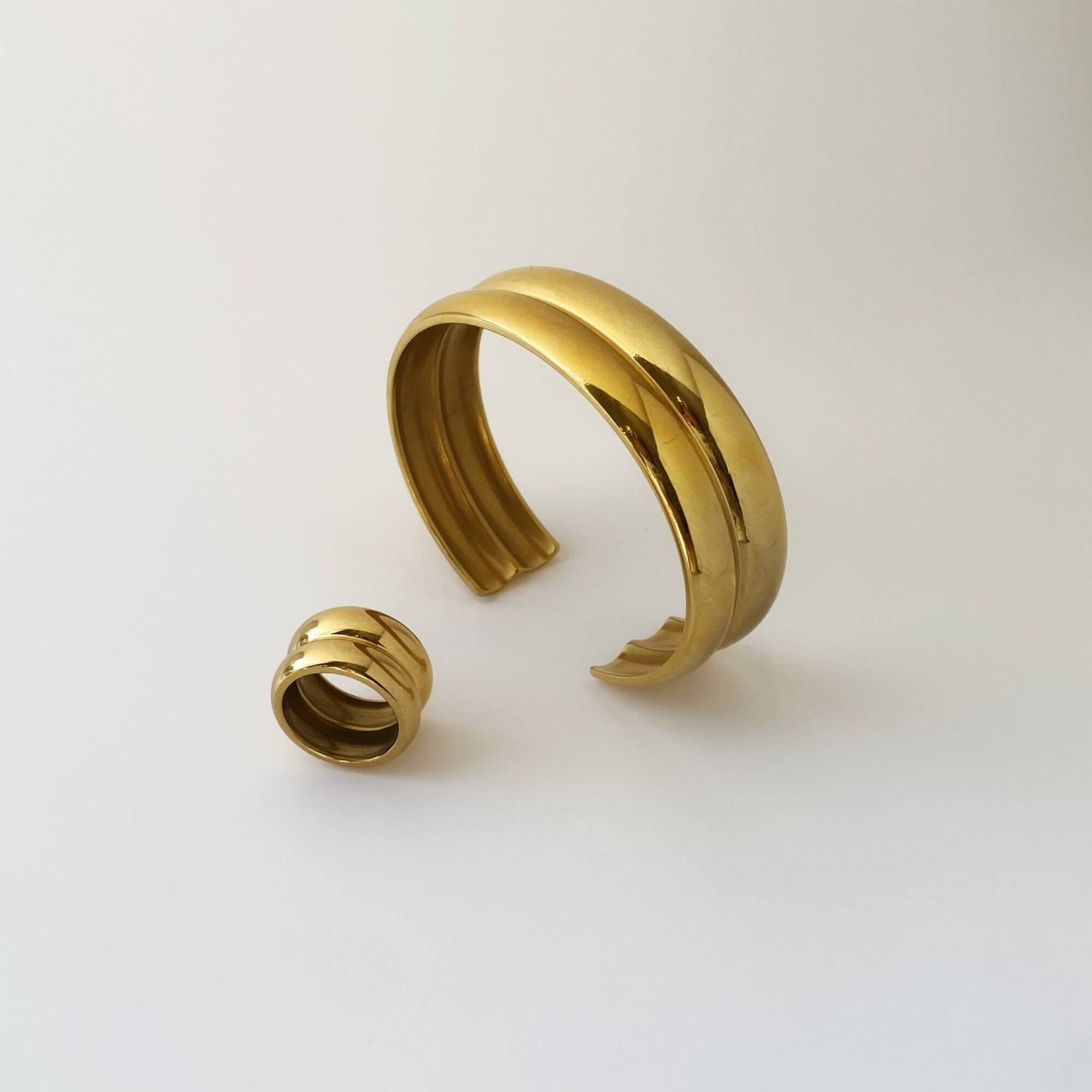 Front view of the KinkoB 18K gold-plated bold bangle cuff bracelet by Kampy Designs, displaying its sleek and contemporary design.