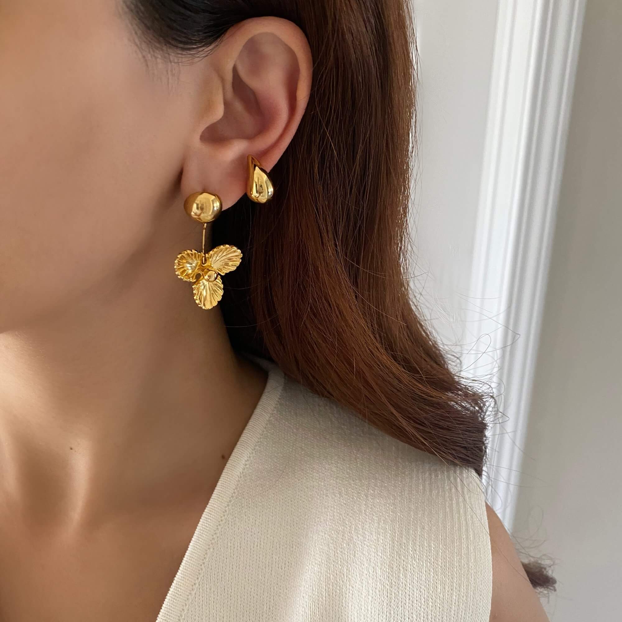 Stacked view of the KloverE 18K gold-plated bold clover drop earrings by Kampy Designs, layered to highlight their stylish and sophisticated appeal.