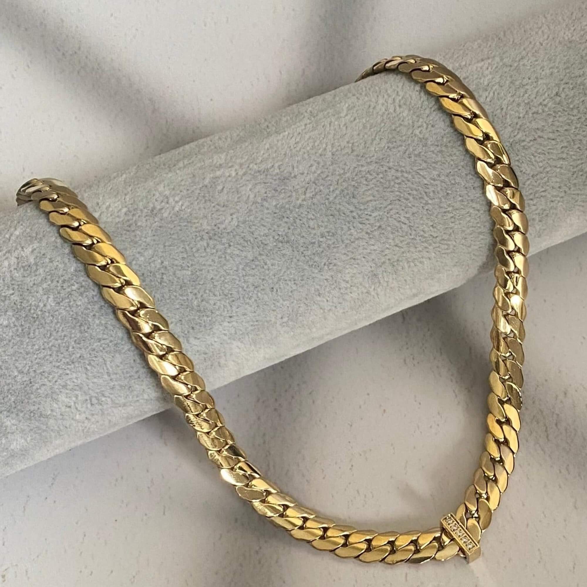 Side view of the KeikoN 18K gold-plated bold CZ necklace by Kampy Designs, highlighting its detailed craftsmanship and sparkling cubic zirconia setting.