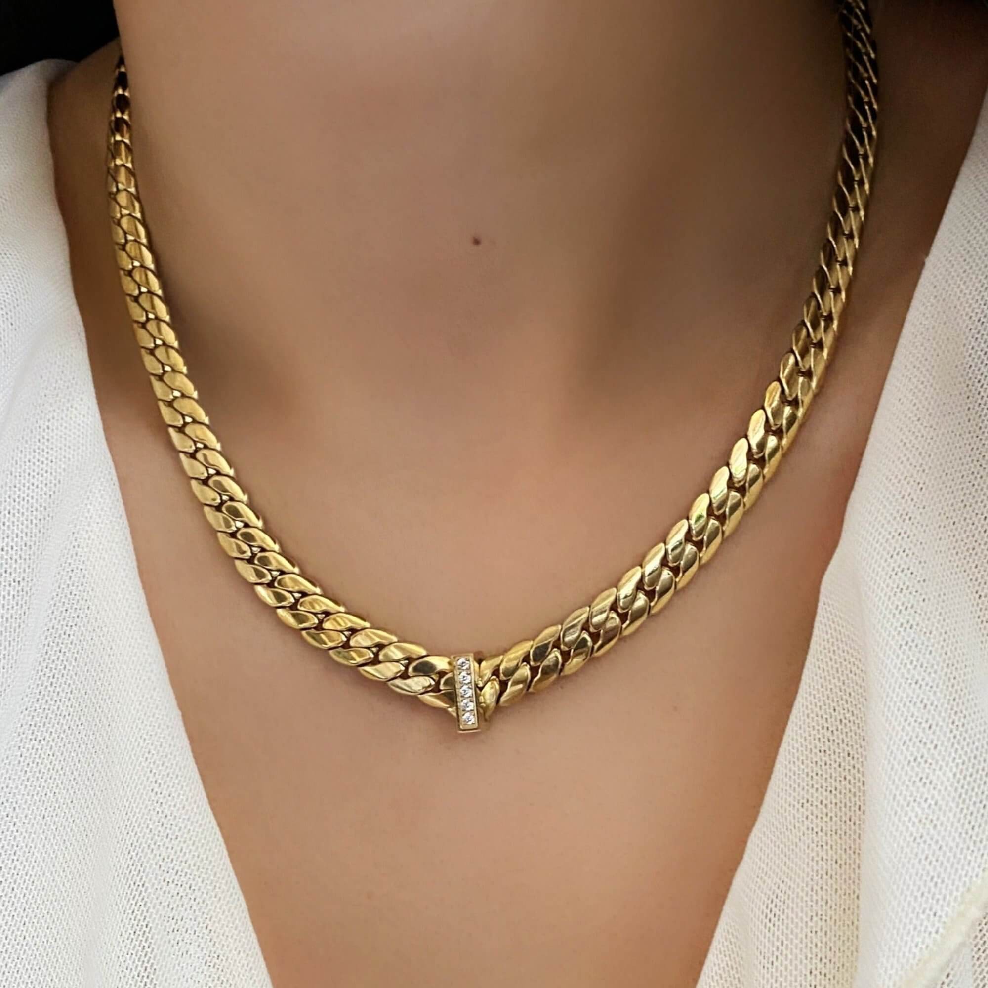 The KeikoN 18K gold-plated bold CZ necklace by Kampy Designs, styled and worn for an elegant and glamorous jewelry statement.