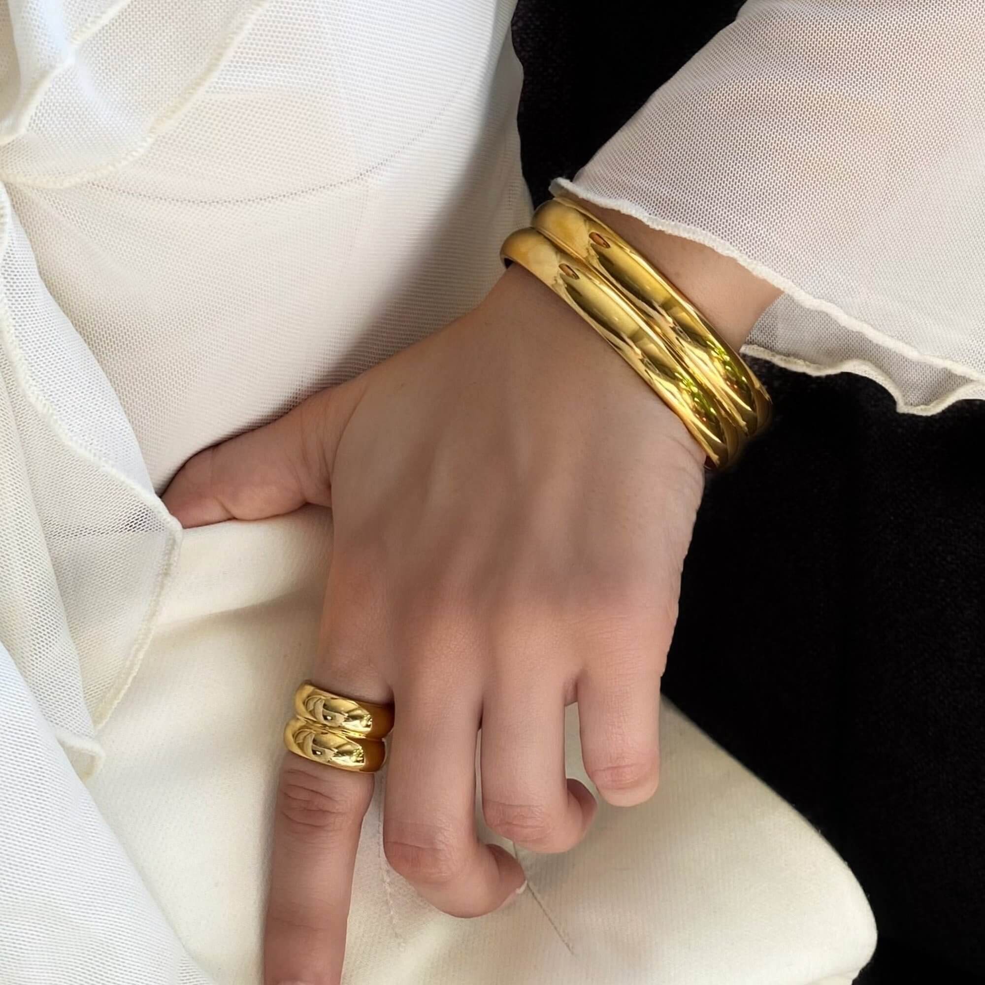 The KinkoR 18K gold-plated chunky bold ring by Kampy Designs, styled in a modern stack for a trendy and bold statement.