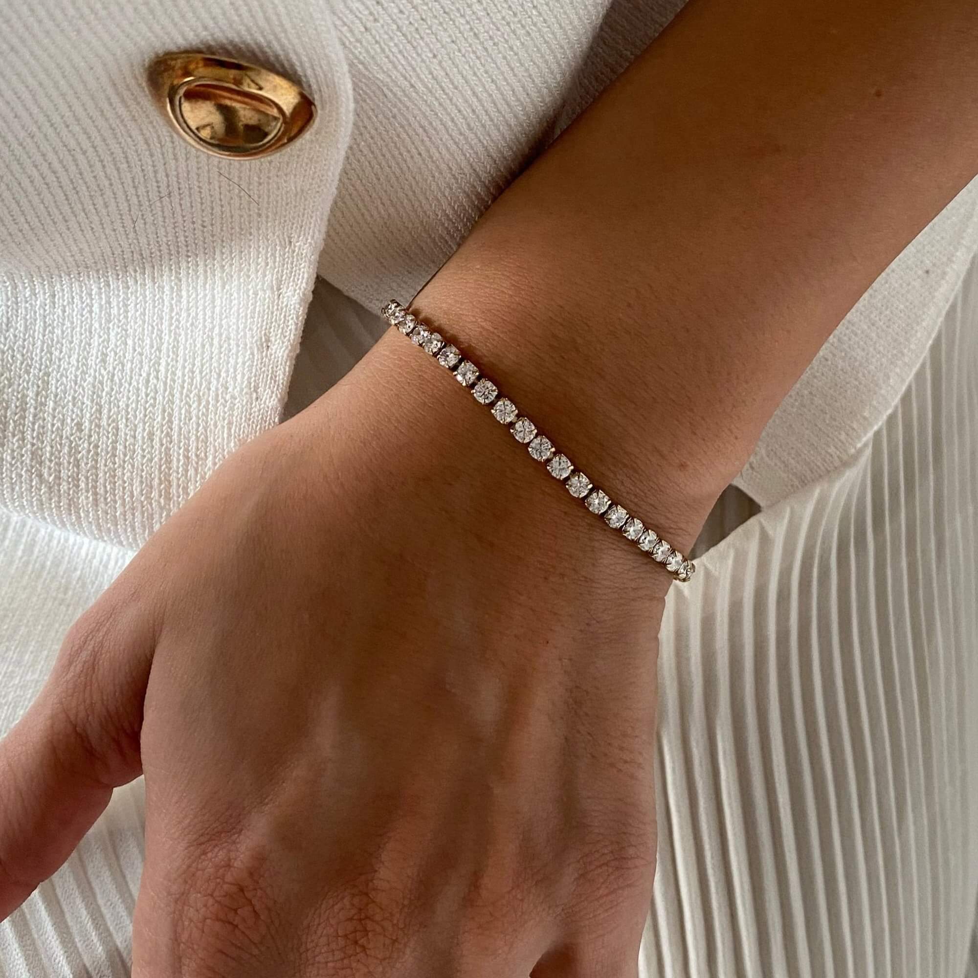 Alternative angled view of the KennisB 18K gold-plated CZ tennis bracelet by Kampy Designs, capturing its exquisite shine and delicate setting.