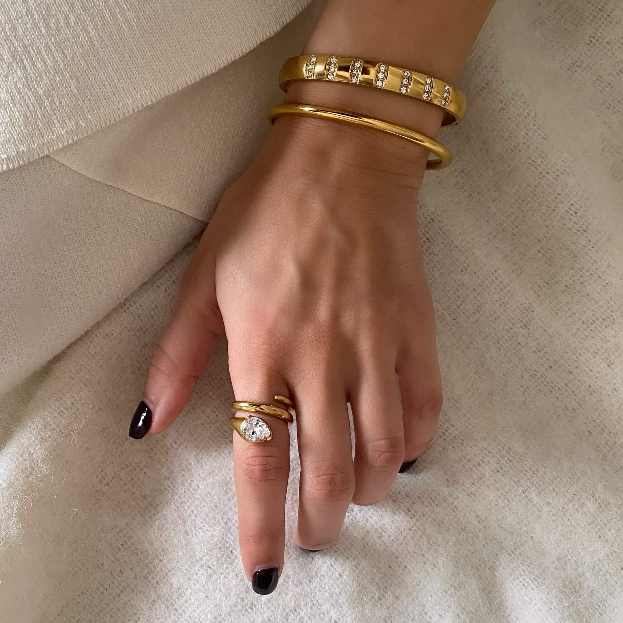 Full view of the KinderR 18K gold-plated diamond serpent ring by Kampy Designs, showcasing its bold structure and shimmering gemstone details.