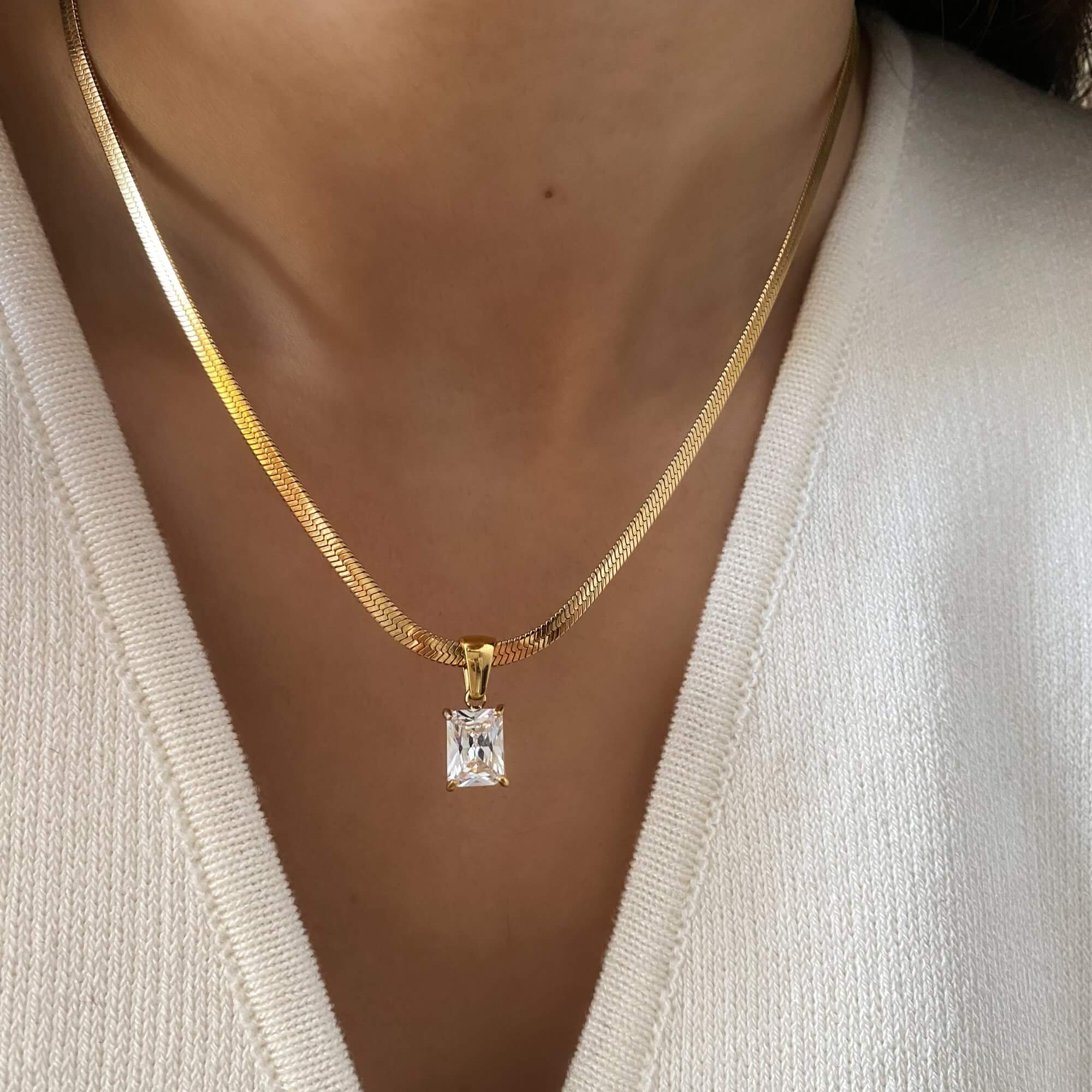 Front view of the KonokoN 18K gold-plated emerald-cut CZ pendant necklace by Kampy Designs, featuring a brilliant emerald-cut cubic zirconia centerpiece.