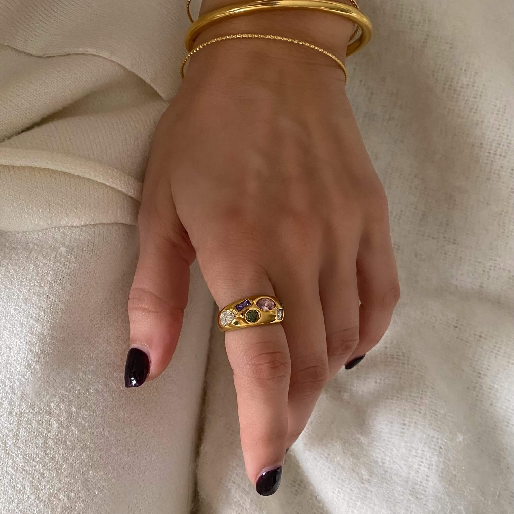Side view of the KemmaR 18K gold-plated gemstone dome ring by Kampy Designs, displaying its smooth curves and vibrant gemstone.