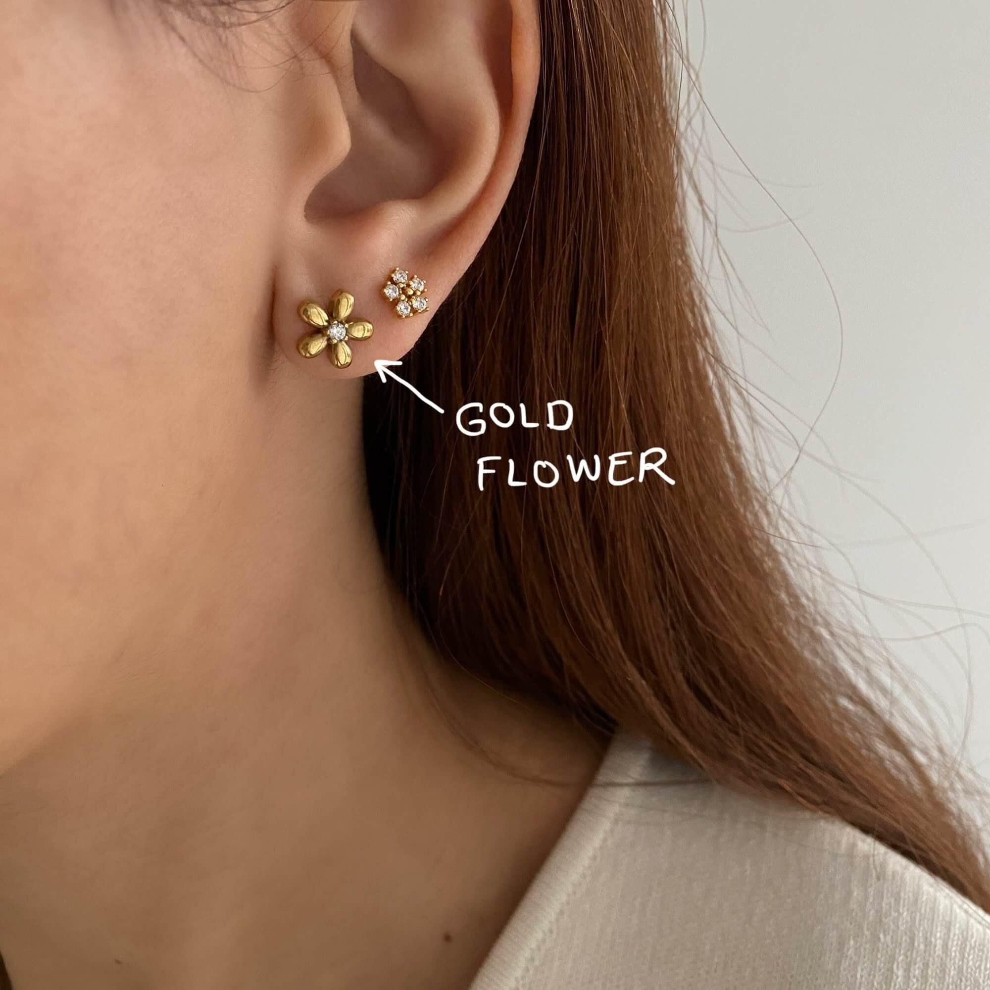Stacked view of the KayleyE 18K gold-plated flower stud earring set by Kampy Designs, featuring both gold and CZ diamond variations
