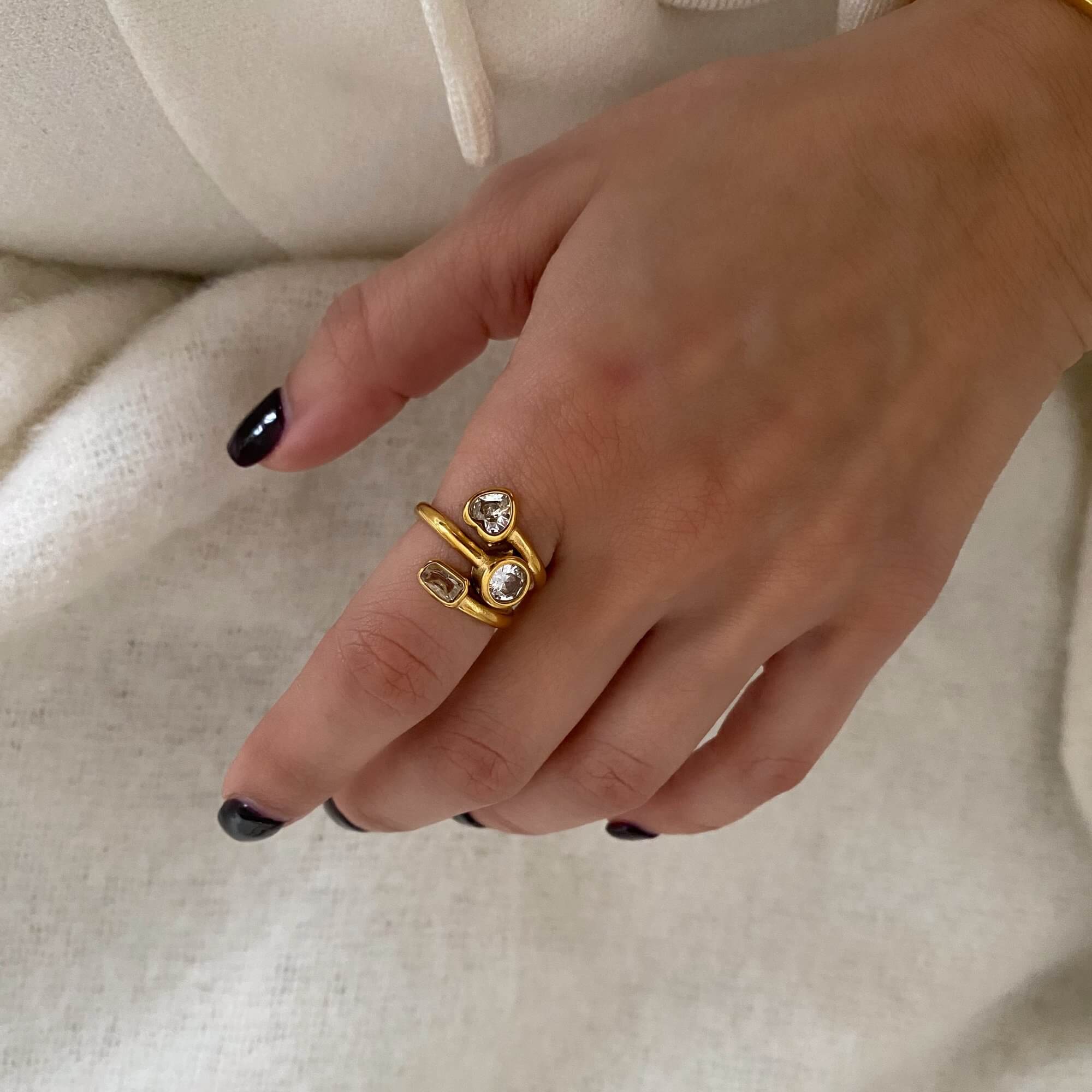 Close-up of the KastleR 18K gold-plated multi-stone spiral ring by Kampy Designs, highlighting the intricate gemstone placement and fine craftsmanship.