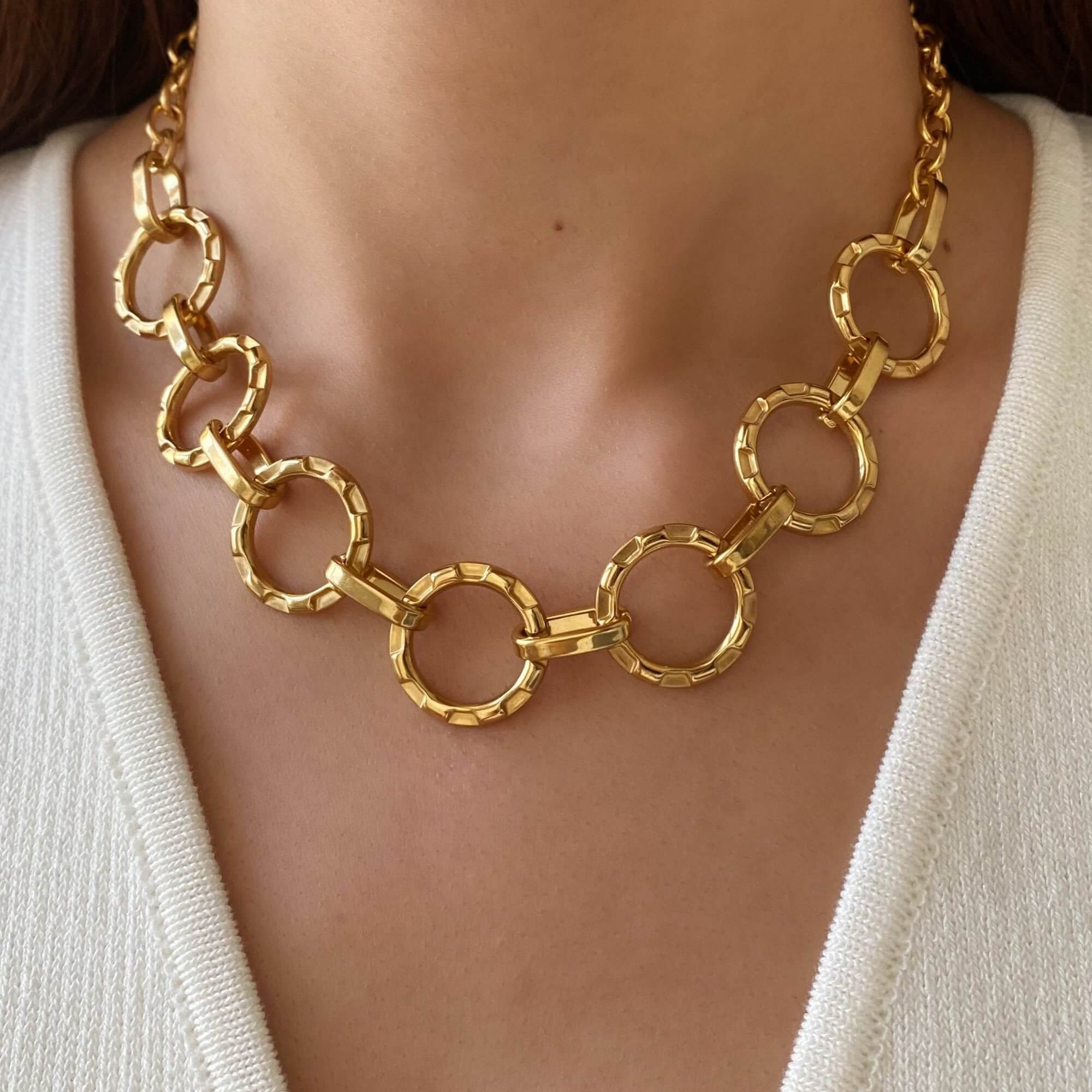 Alternative worn view of the KostyN 18K gold-plated open circle charm necklace by Kampy Designs, highlighting its refined charm and modern elegance.