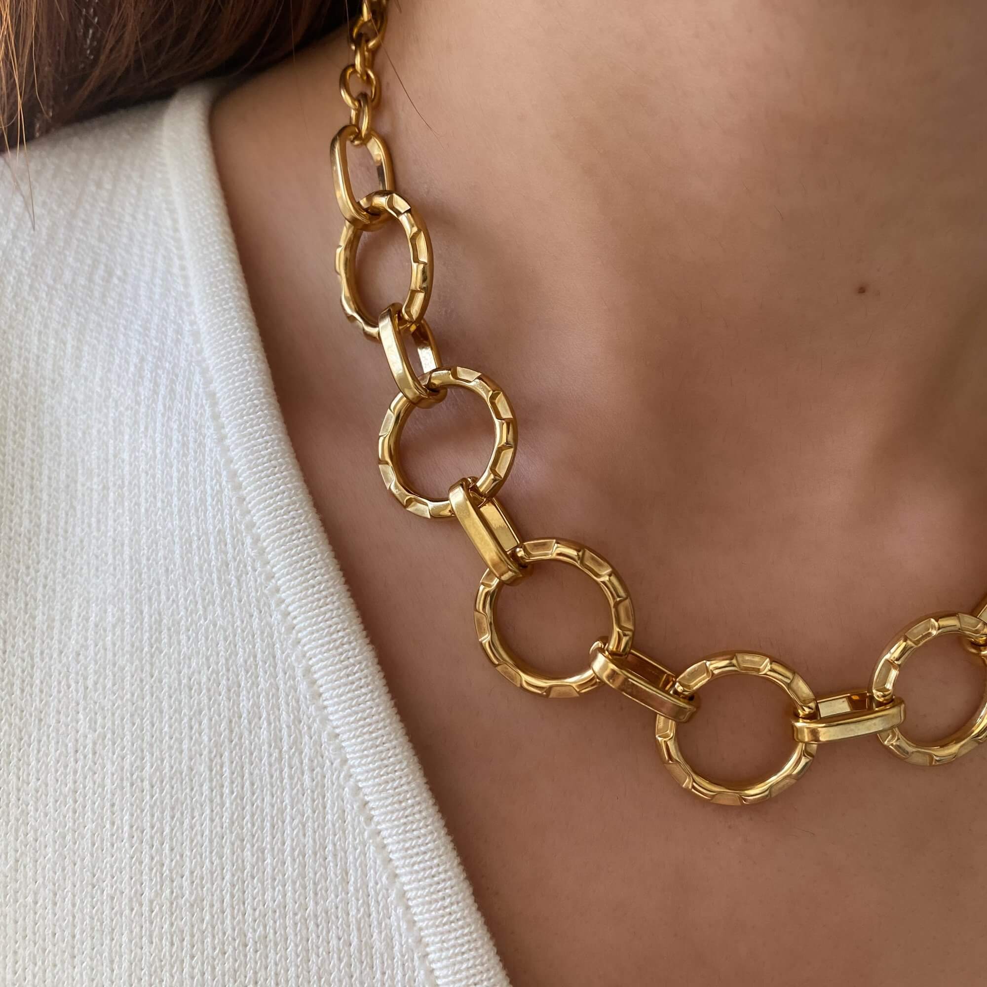 Zoomed-in view of the KostyN 18K gold-plated open circle charm necklace by Kampy Designs, showcasing its fine craftsmanship and smooth gold plating.