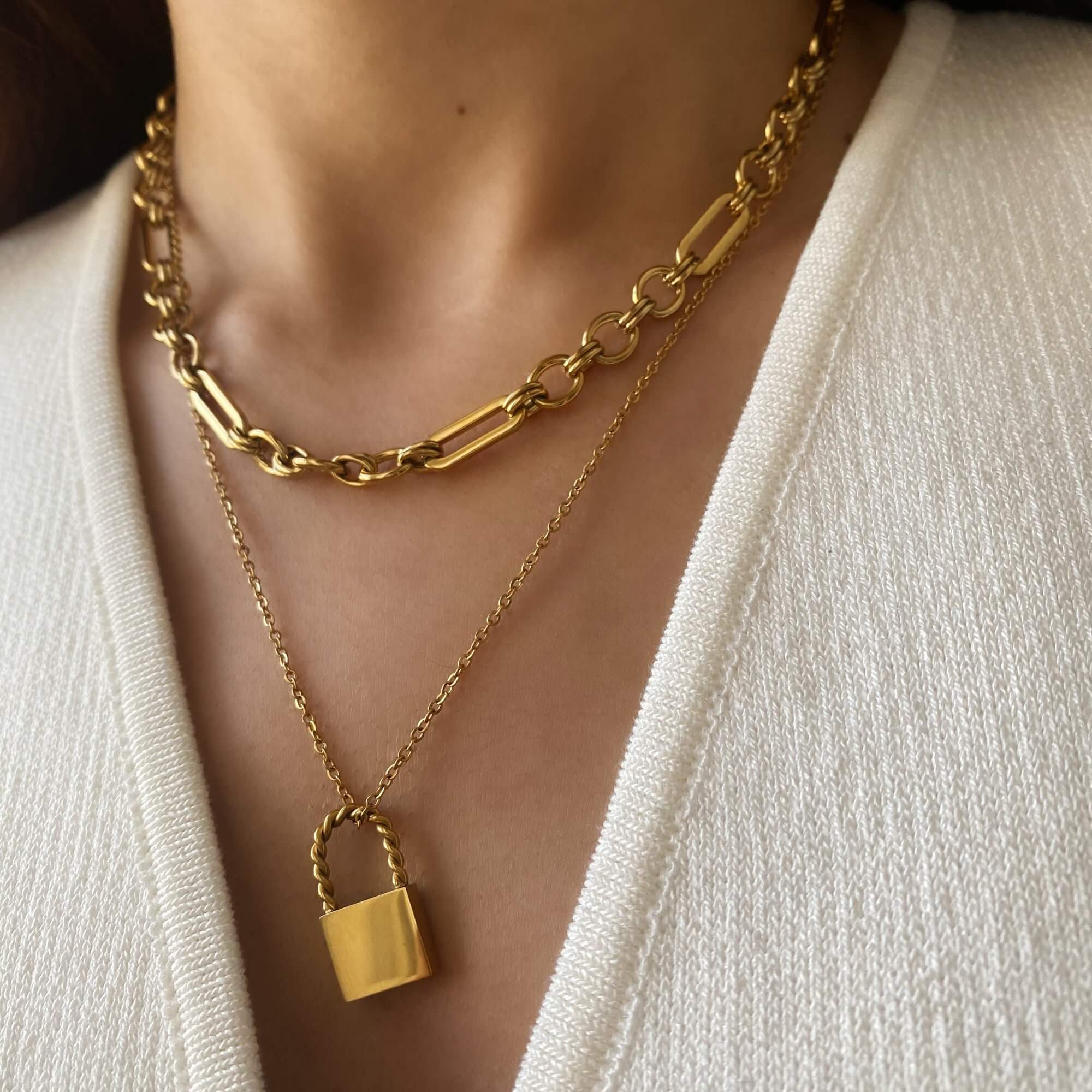 Stacked view of the KinnN 18K gold-plated paperclip link chain choker necklace by Kampy Designs, layered with other chains for a stylish, trendy look.