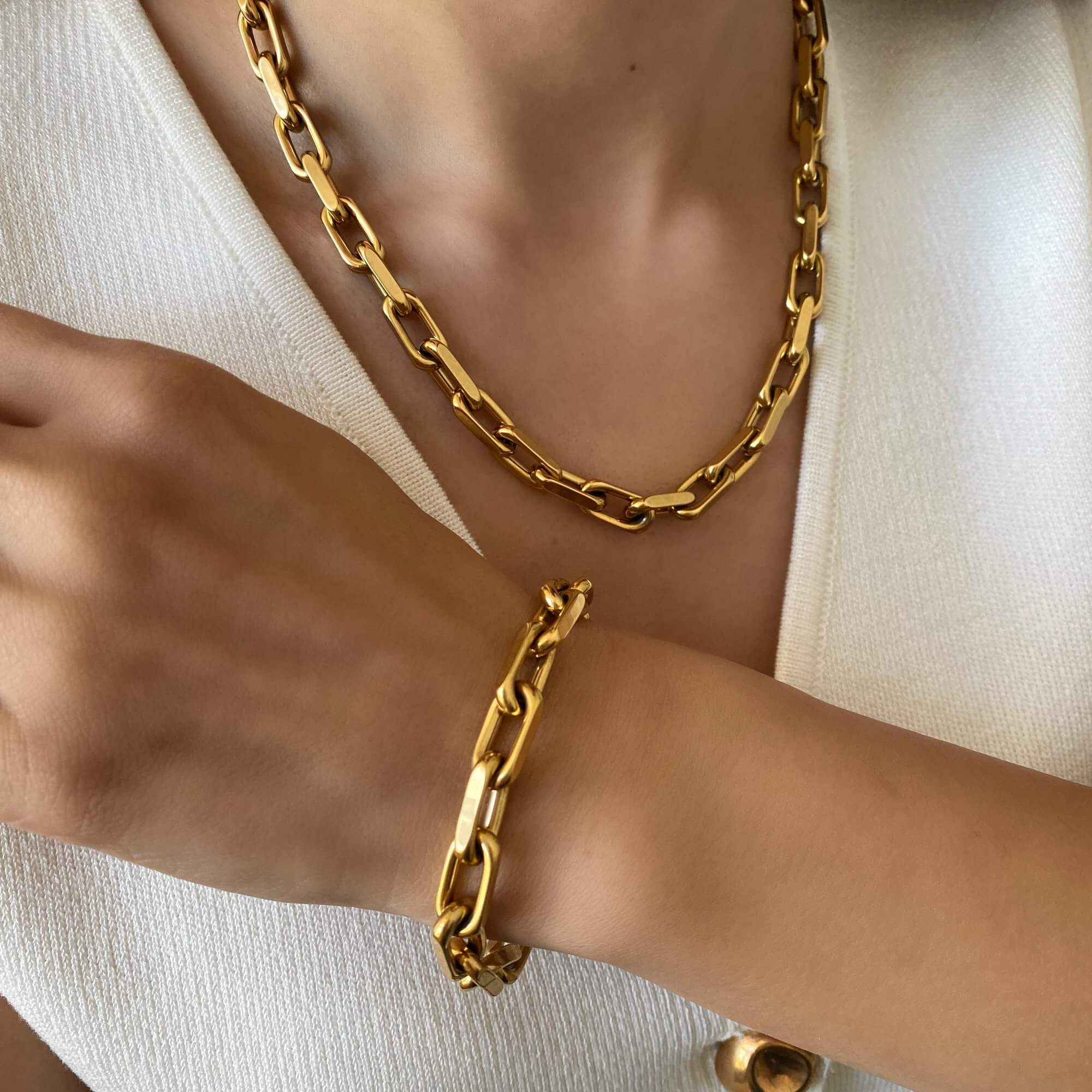 Set view of the KlinkN 18K gold-plated thick link chain necklace by Kampy Designs, layered with other necklaces for a bold, fashion-forward look.