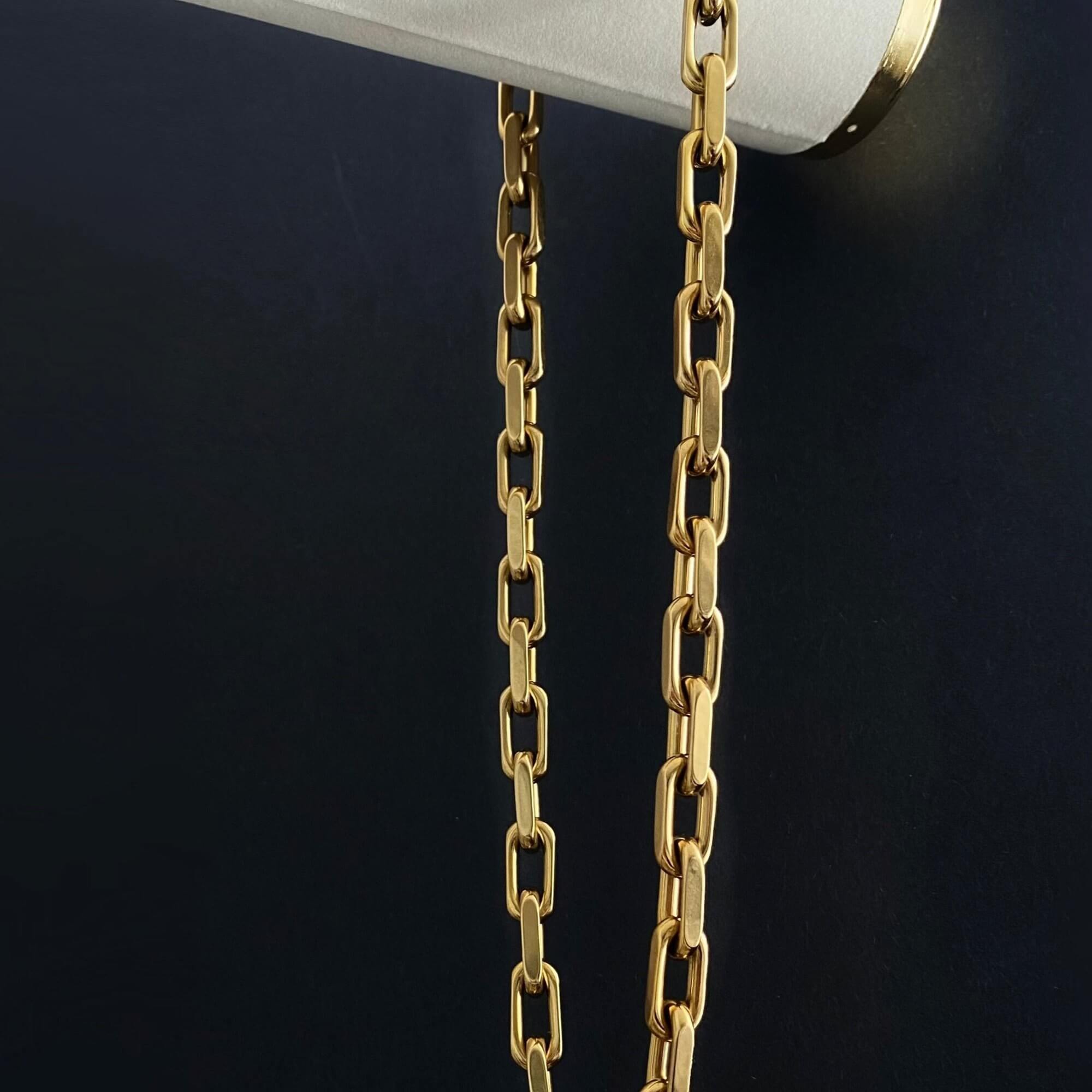 Side view of the KlinkN 18K gold-plated thick link chain necklace by Kampy Designs, emphasizing its substantial weight and timeless appeal.