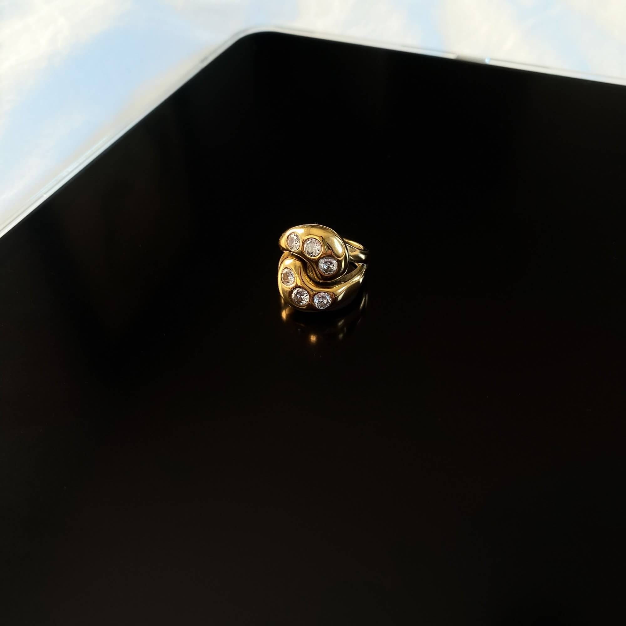 Front view of the KassyR 18K gold-plated yin-yang CZ ring by Kampy Designs, displaying its bold yet balanced yin-yang symbol encrusted with cubic zirconia.