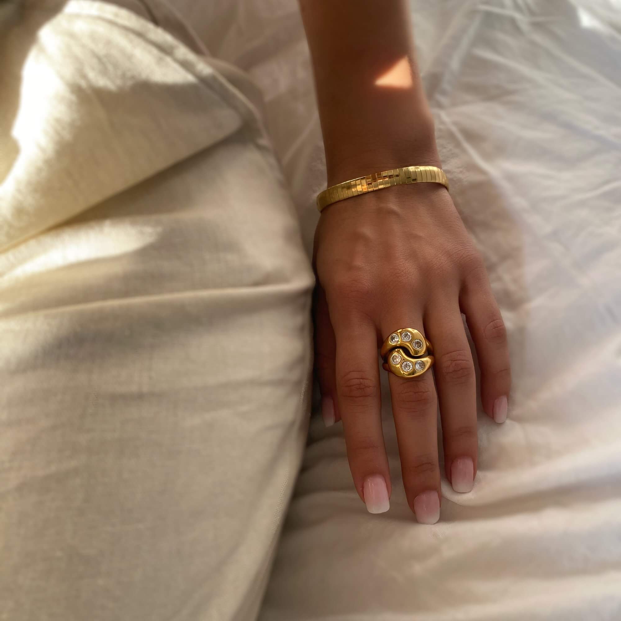 The KassyR 18K gold-plated yin-yang CZ ring by Kampy Designs, styled elegantly for a balanced and spiritual aesthetic.