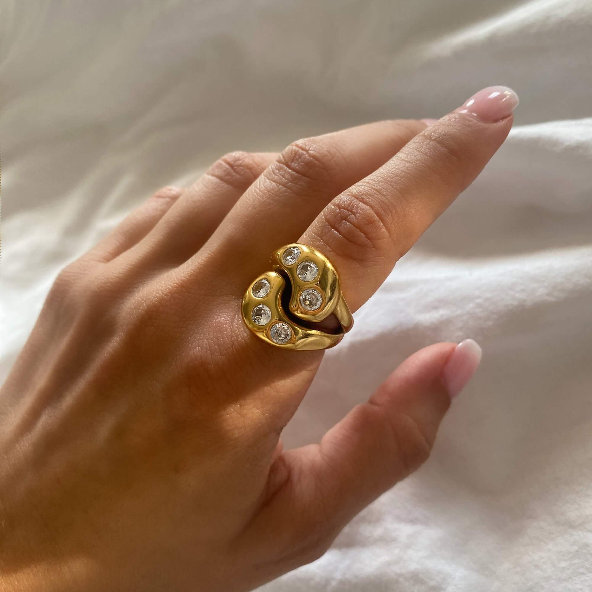Top view of the KassyR 18K gold-plated yin-yang CZ ring by Kampy Designs, capturing its sleek gold finish and detailed yin-yang pattern.