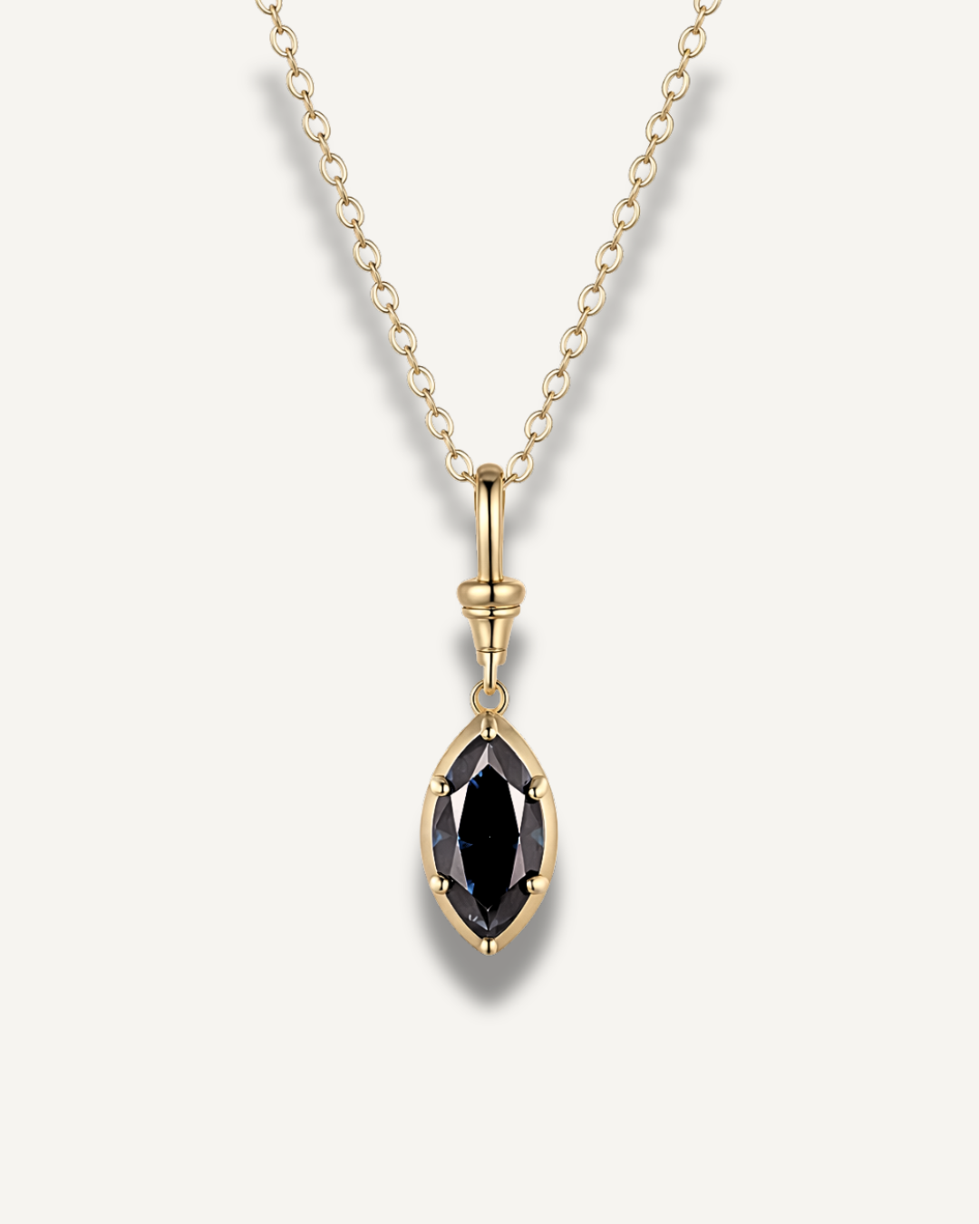 Marquise midnight blue moissanite pendant necklace set in 14K gold-plated 925 sterling silver on gold chain.