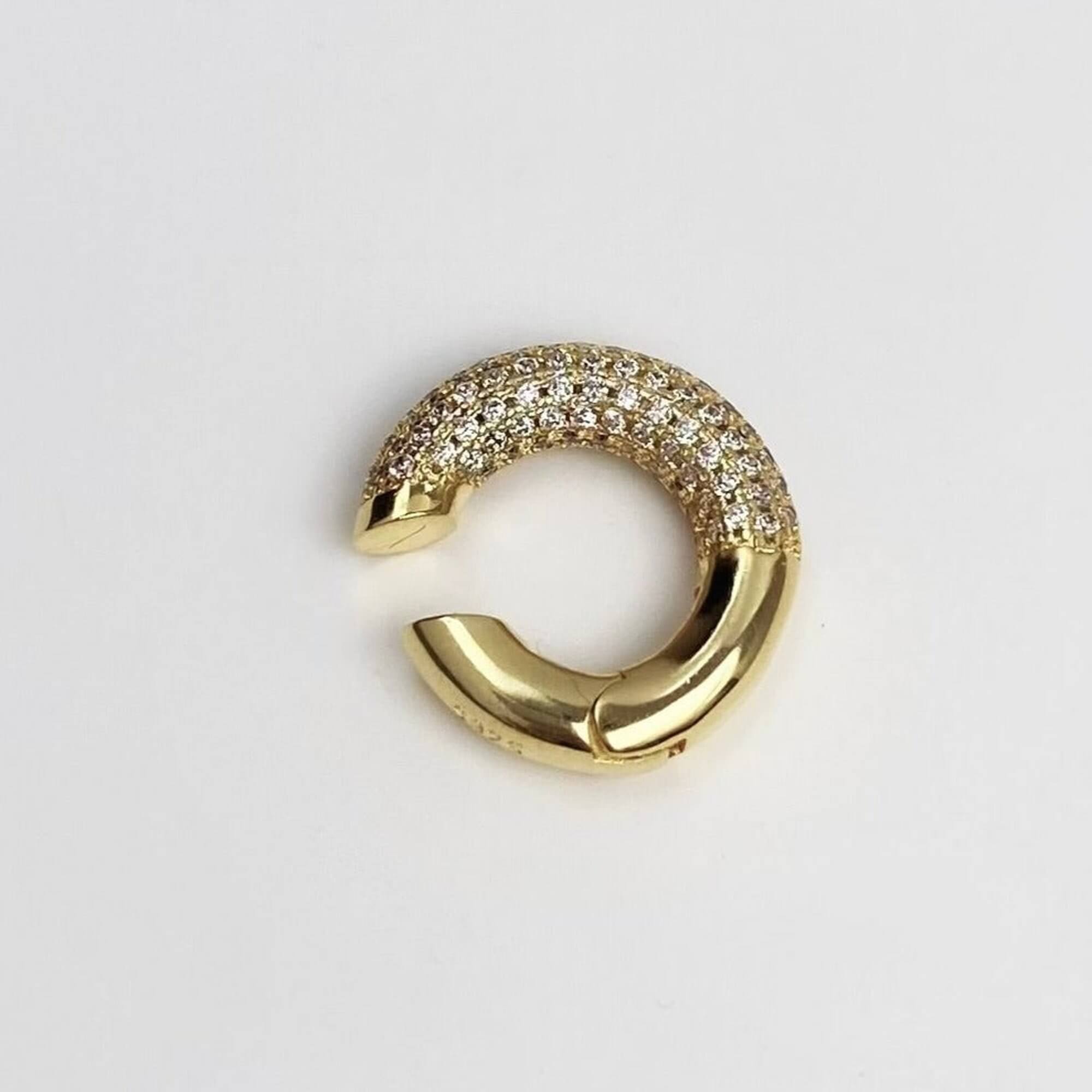 Top view of the KellyE 925 sterling silver pavé diamond cuff earrings by Kampy Designs, highlighting their curved design and shimmering pavé stones.