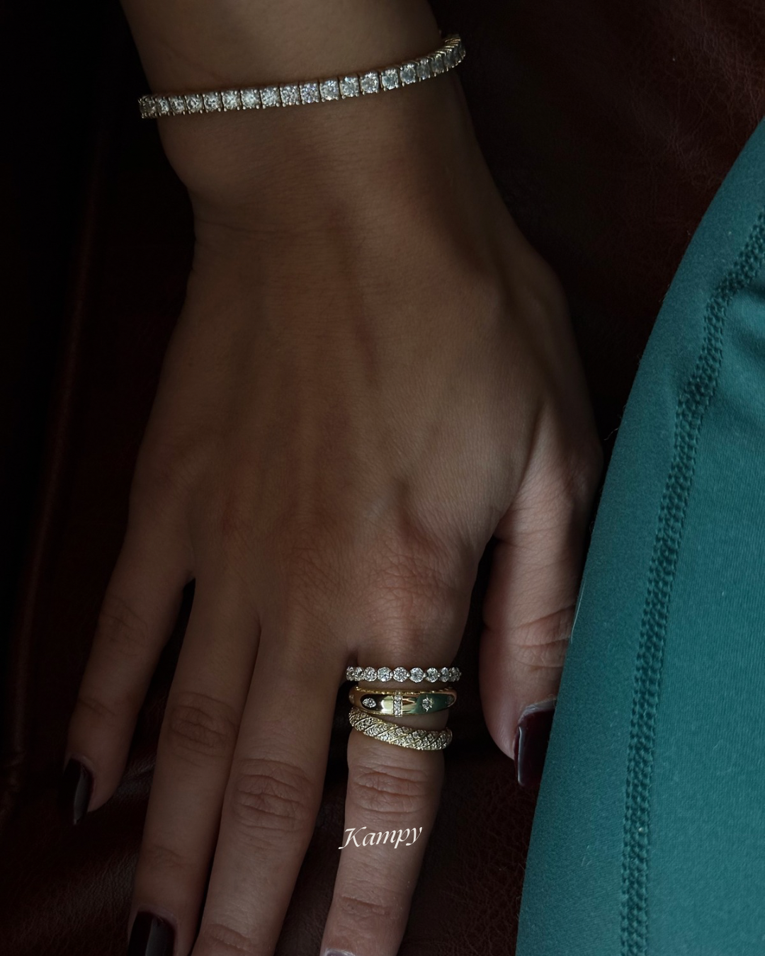 Moissanite ring stack set on model hand styled with tennis bracelet, Kampy Designs