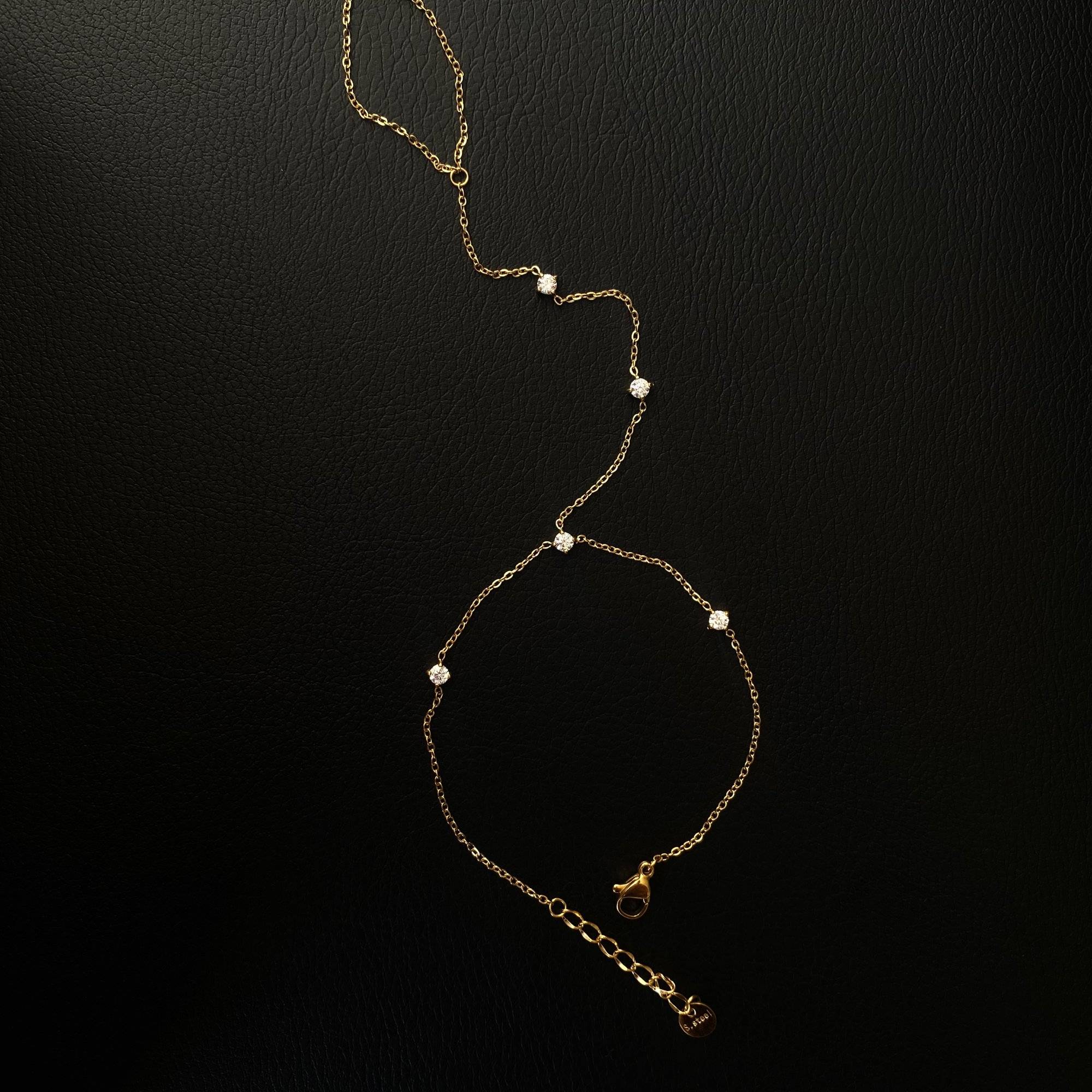 KetsiyaB diamond hand chain bracelet by Kampy Designs, shown on model’s hand to highlight the intricate hand-to-finger drape and delicate sparkle.