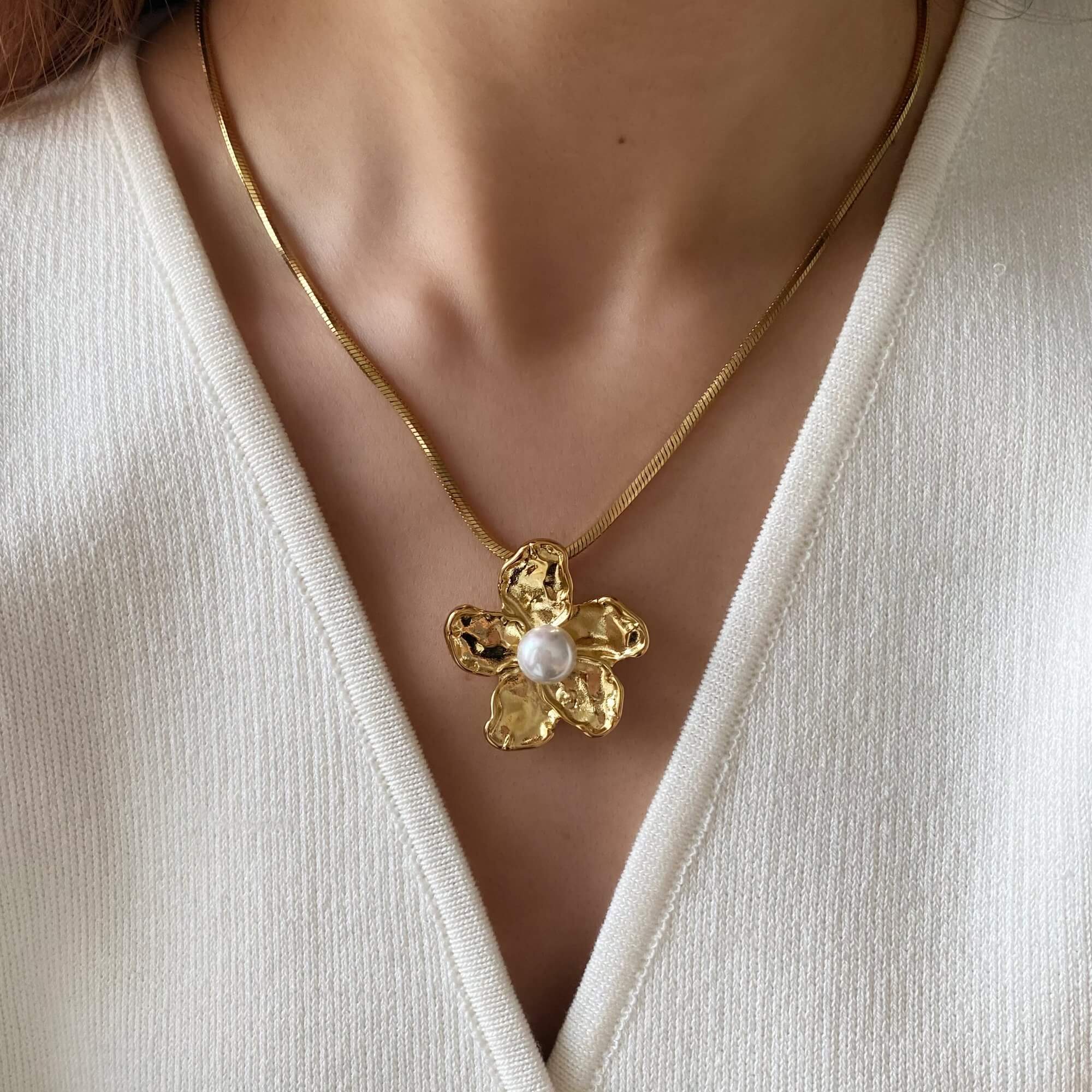 Styled view of the Kloran floral pearl pendant necklace by Kampy Designs, paired with modern accessories for an elegant everyday look.