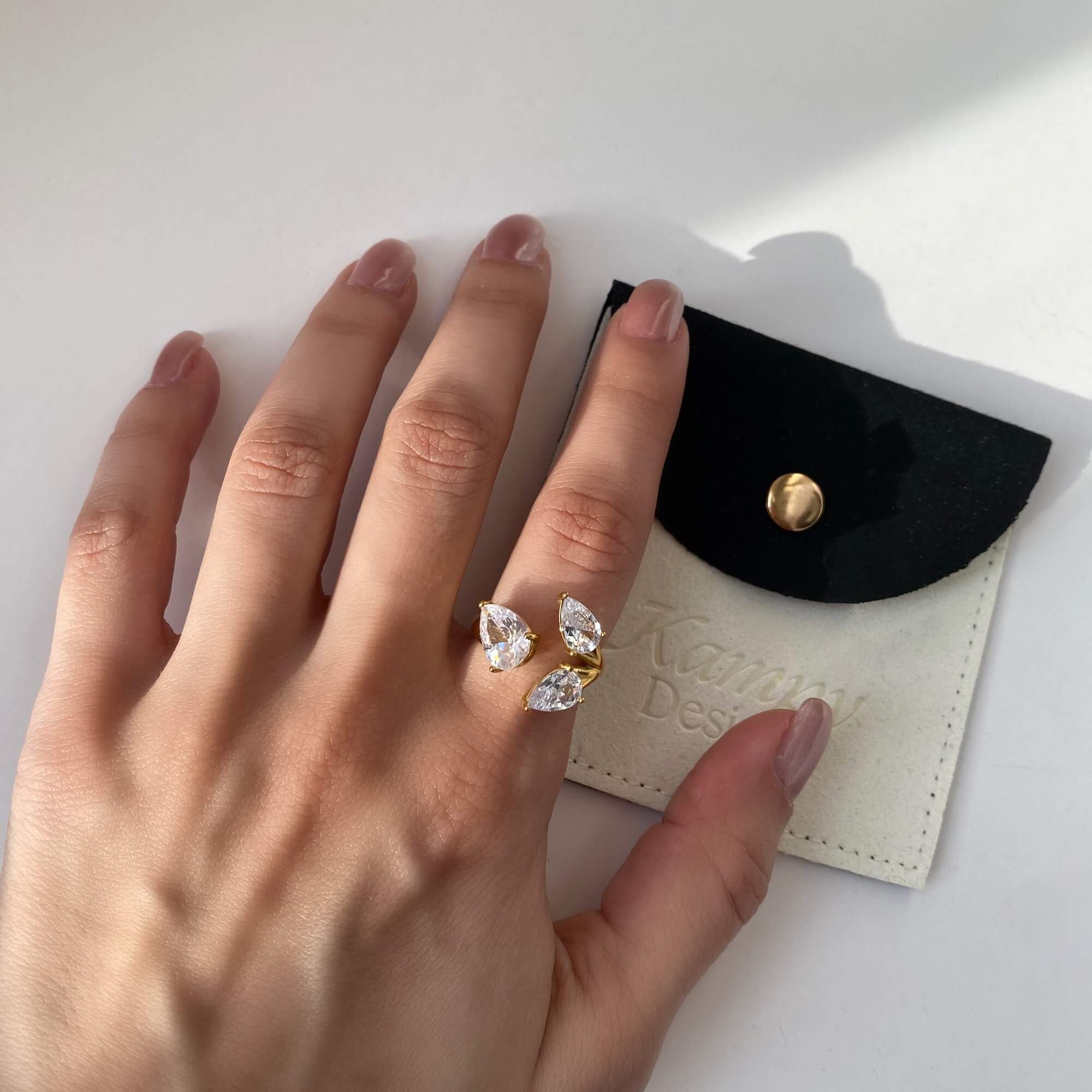 Top view of the KipsyR floral vine ring by Kampy Designs, worn by model to show the ring’s intricate layout and natural curves.