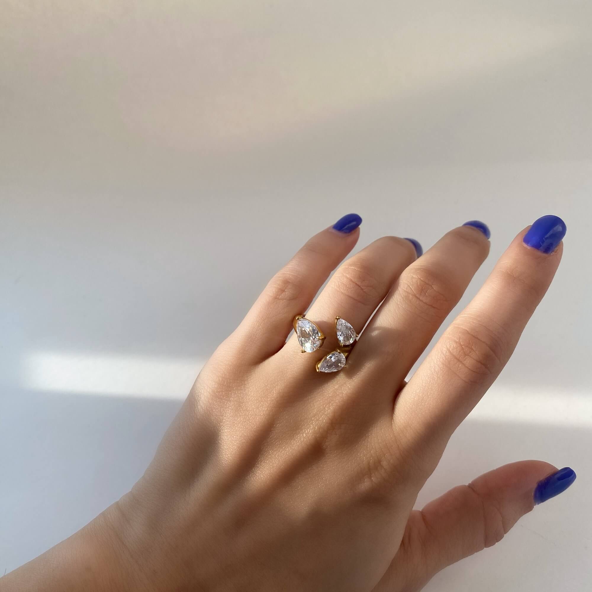 The KipsyR floral vine ring by Kampy Designs, worn by model to demonstrate its natural fit and elegant presence on the finger.