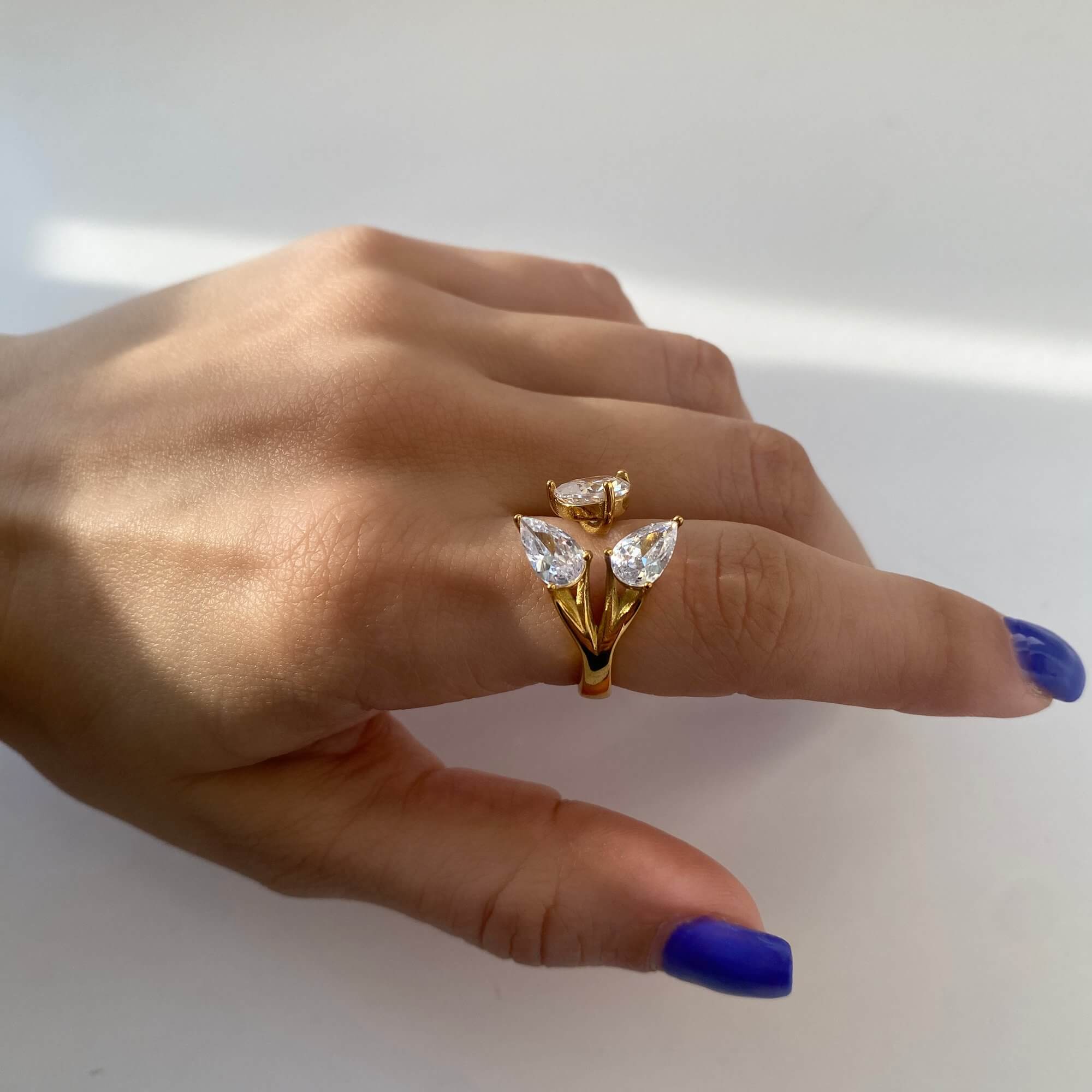 Side view of the KipsyR floral vine ring by Kampy Designs, showcasing the sculpted vine design and elegant band profile.