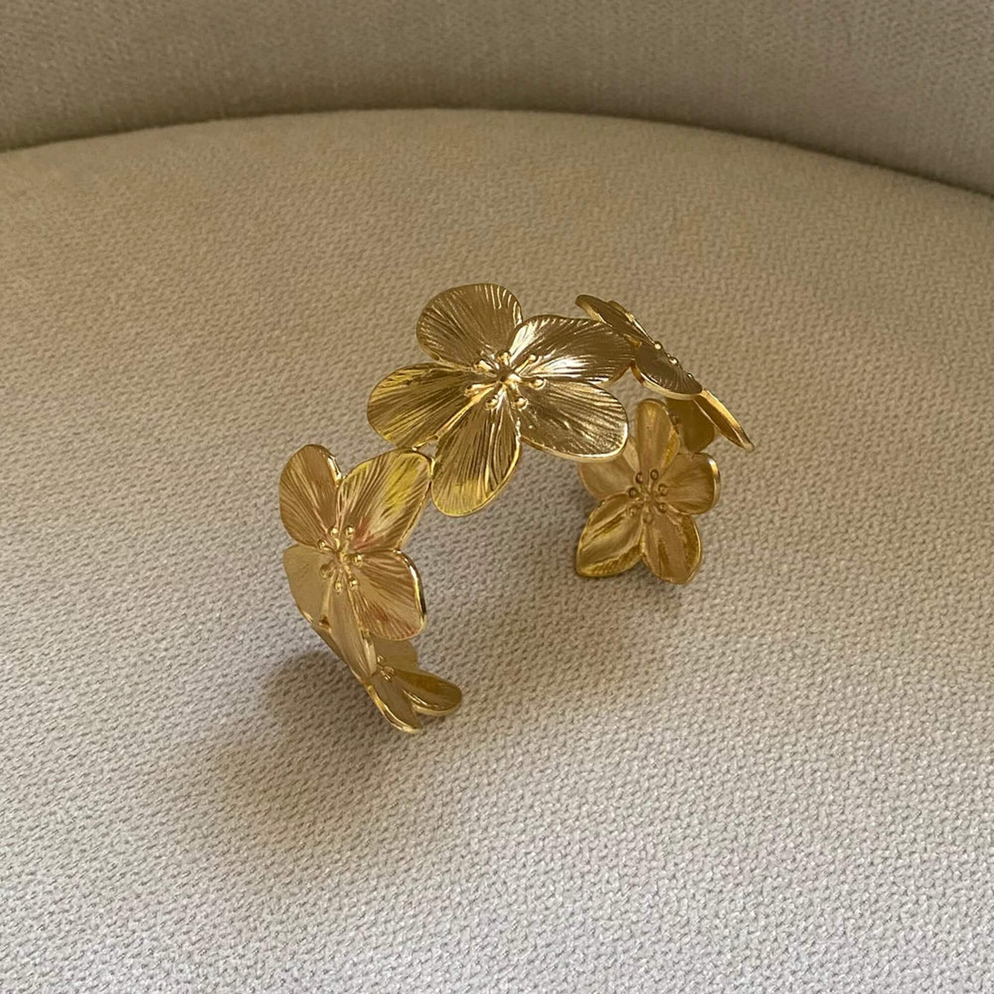 Close-up of the KloraB hibiscus flower cuff bracelet by Kampy Designs, highlighting its intricate flower details and elegant craftsmanship.