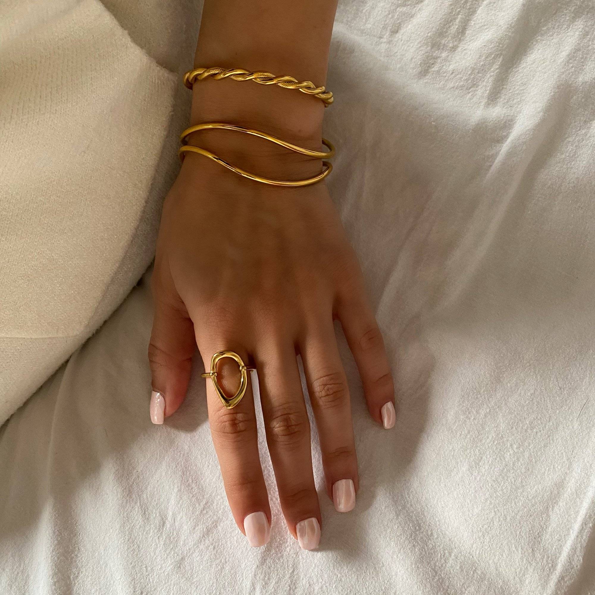 Styled view of KatyR hollow oval ring by Kampy Designs, worn on model to showcase its bold yet elegant silhouette.