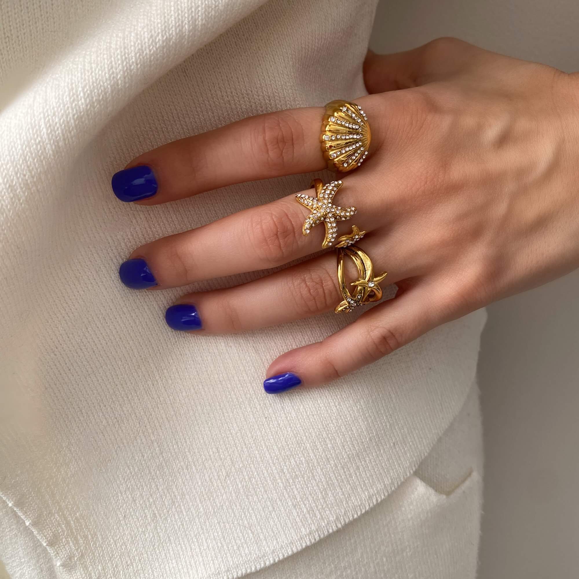 Side view of Ocean Ring Set by Kampy Designs, showing the varying band heights and harmonious design across the trio.