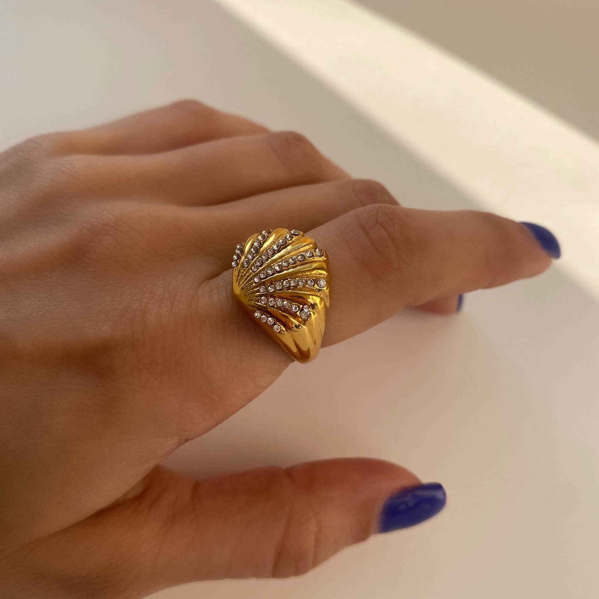 Angled view of Ocean Ring Set Design A by Kampy Designs, highlighting the gentle wave-like curvature of the ring.