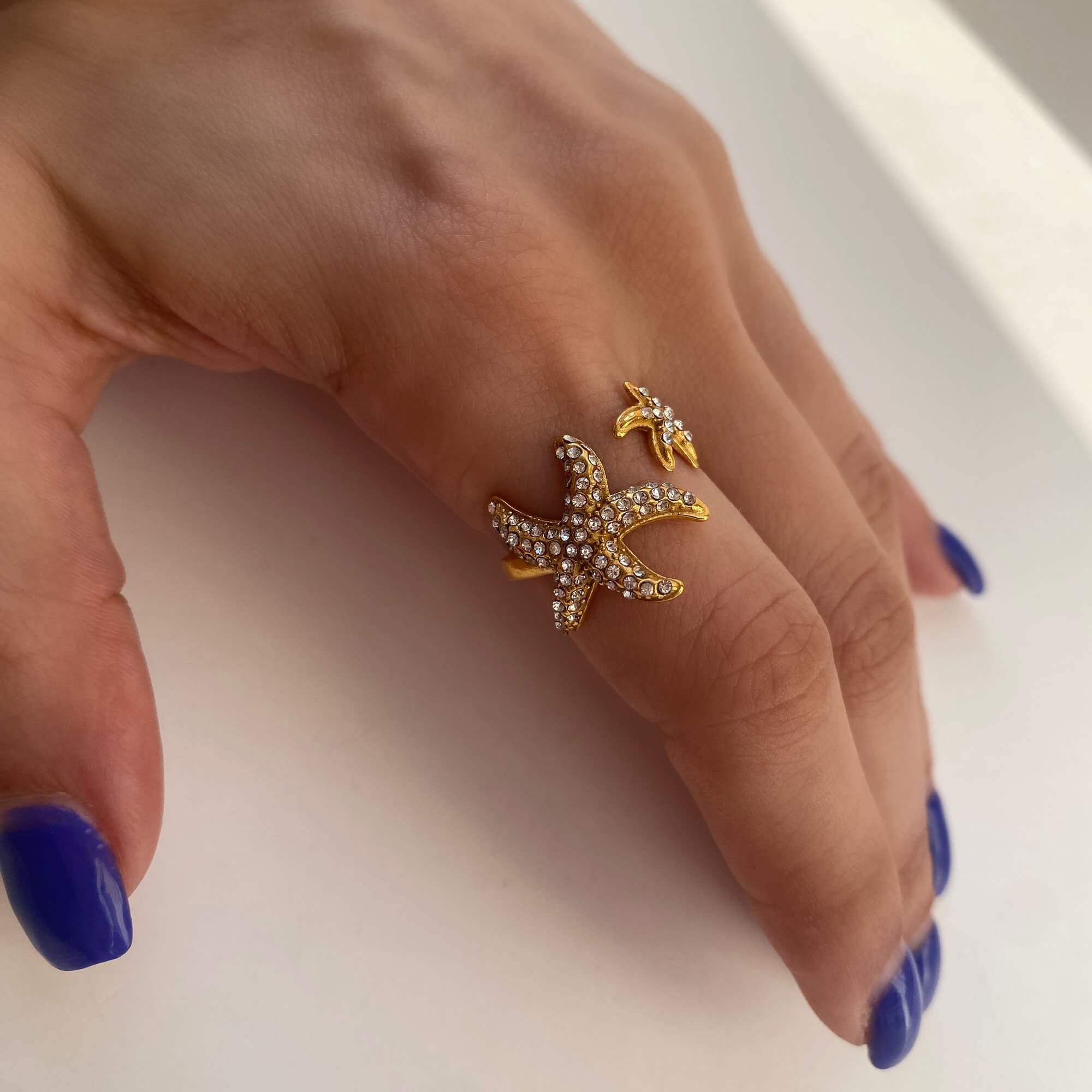 Ocean Ring Set Design B by Kampy Designs, laid flat to reveal its clean wave pattern and modern profile.