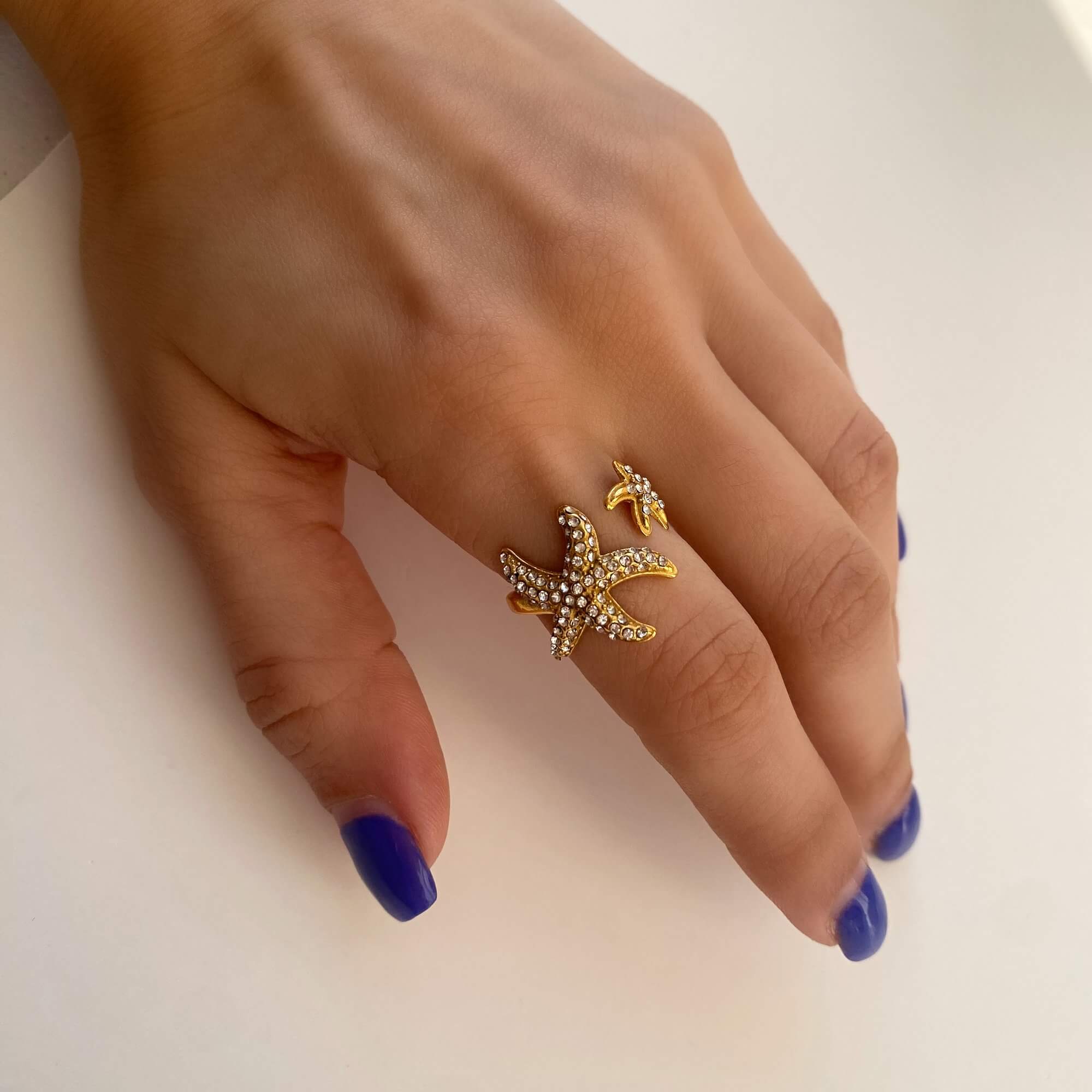 Ocean Ring Set Design C by Kampy Designs, styled individually to show its minimalist oceanic silhouette.