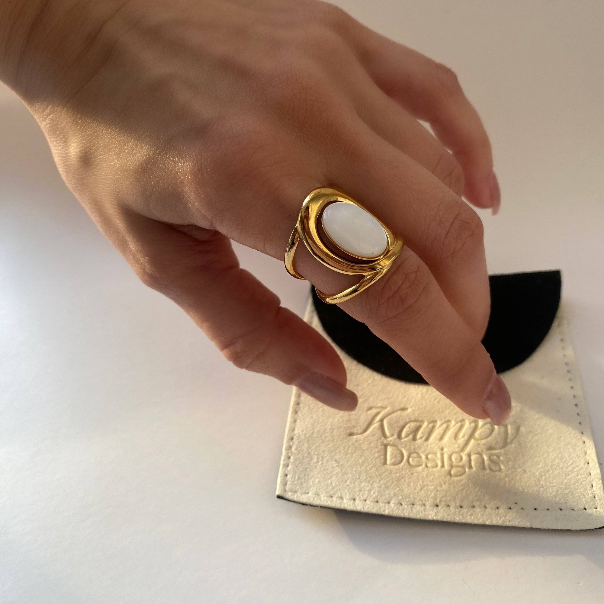 Kostar opal split shank ring by Kampy Designs, styled with a matching ring to create a cohesive, layered jewelry look.