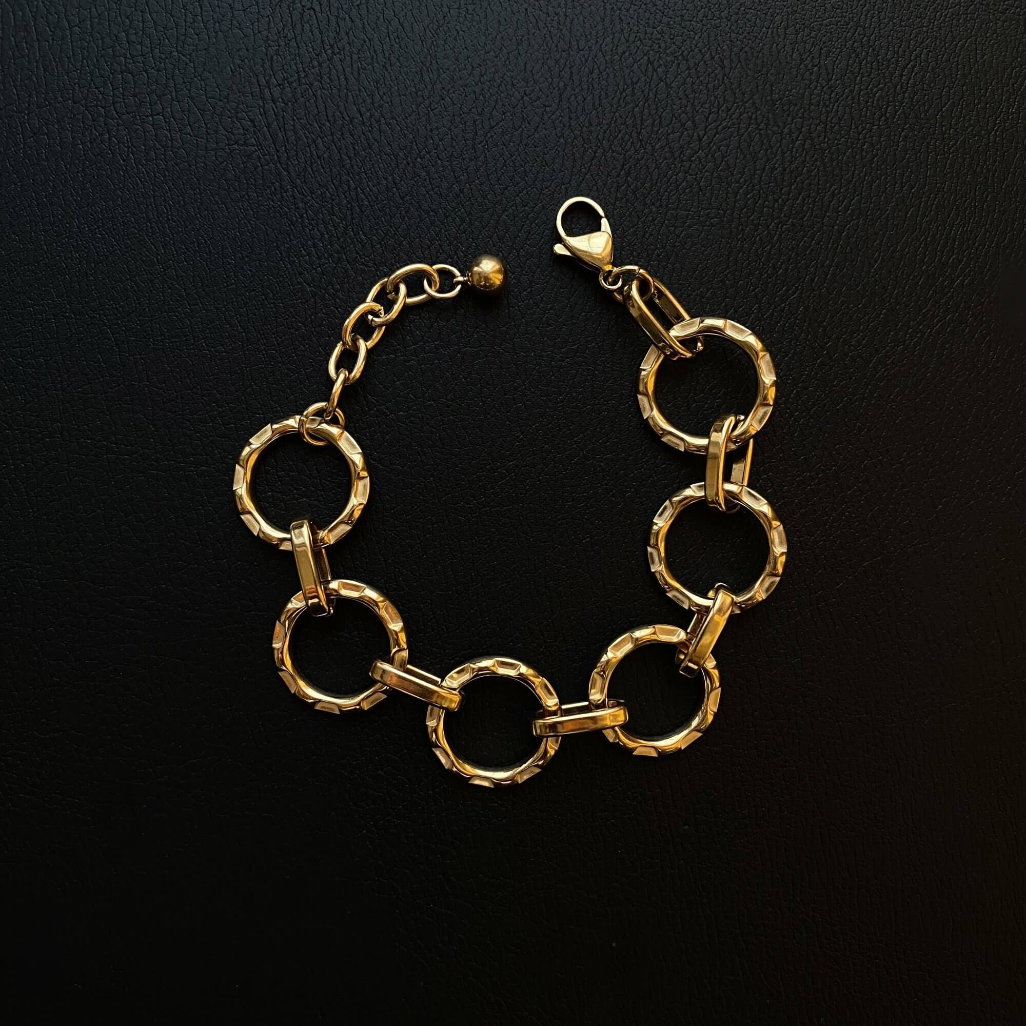 Front view of the KostyB open circle charm bracelet by Kampy Designs, showcasing its polished gold finish and delicate circular charm accents.