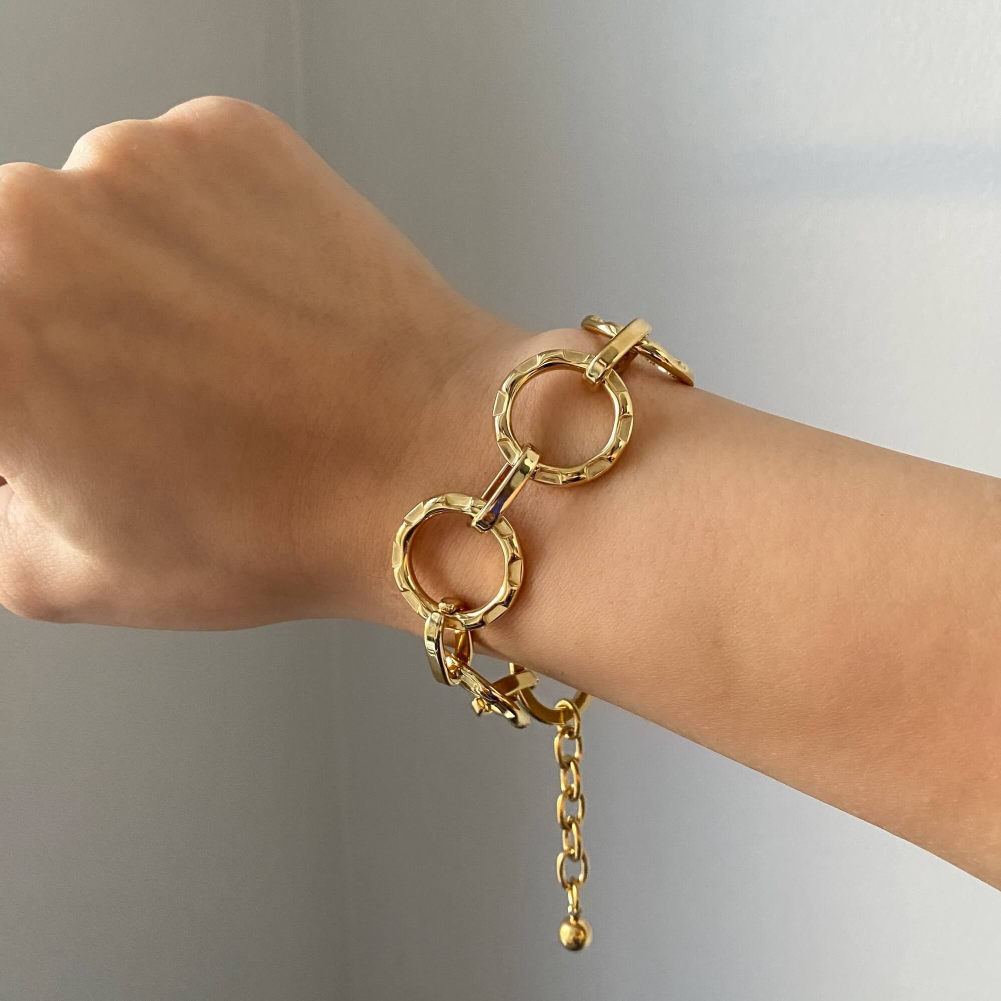 Alternative side view of the KostyB open circle charm bracelet by Kampy Designs, highlighting its intricate chain details and elegant charm design.