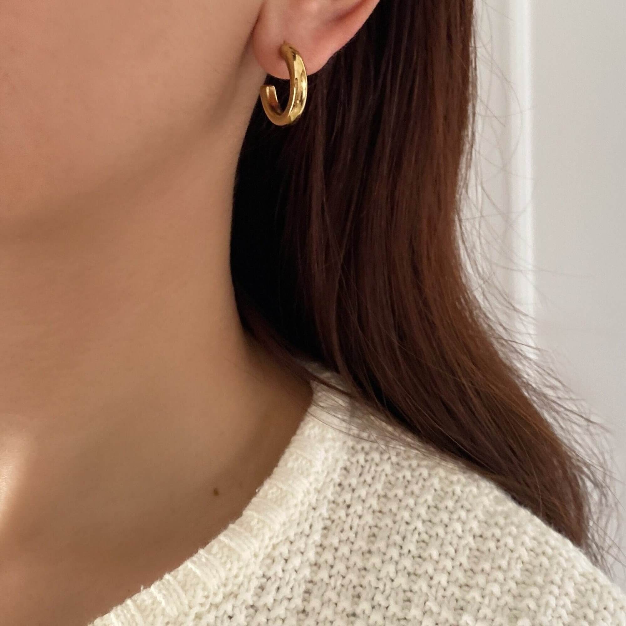 The KarlE small open circle hoop stud earrings by Kampy Designs, designed for a subtle yet elegant everyday look.