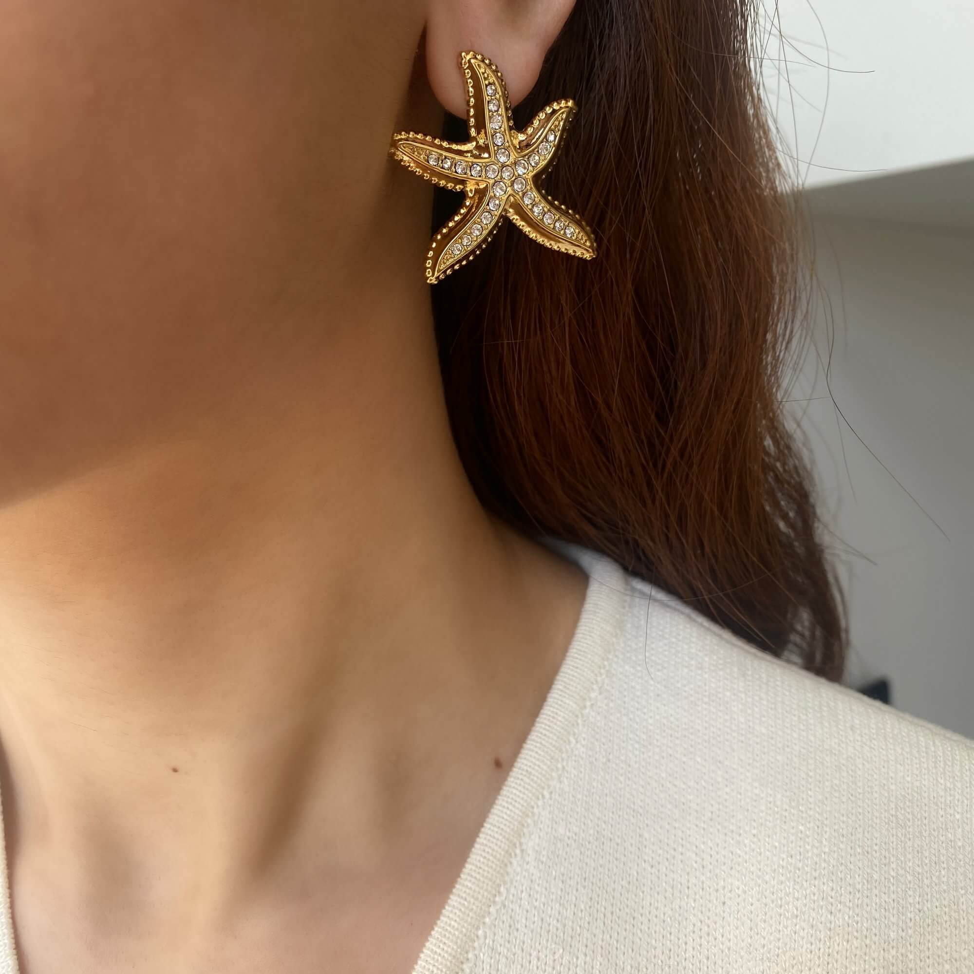Close-up of KariyaE pavé starfish statement earrings by Kampy Designs, emphasizing the intricate pavé crystal detailing and bold seaside charm.