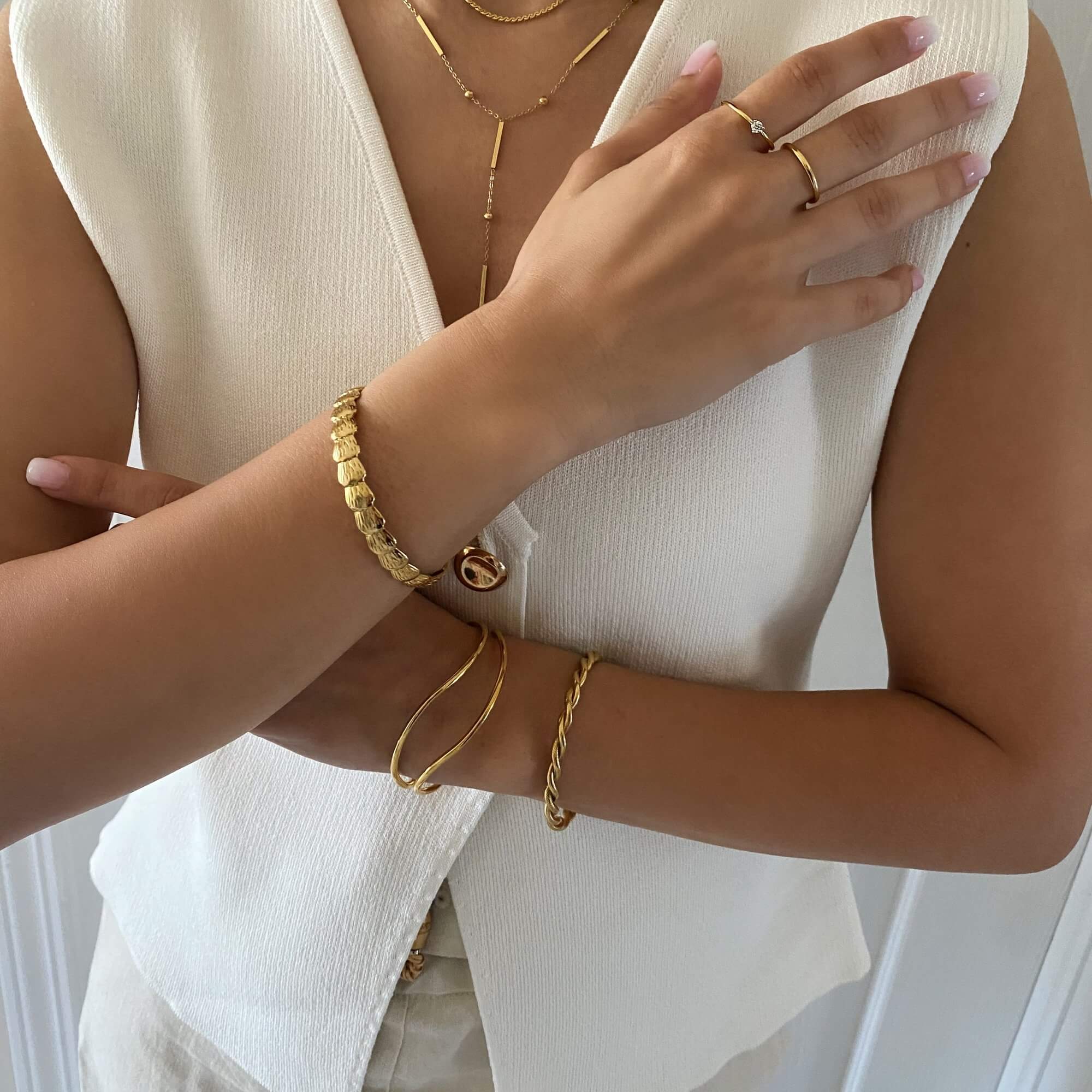Alternative styled view of the KyraB rope twist cuff bracelet in gold and two-toned by Kampy Designs, designed for an elegant and refined look.