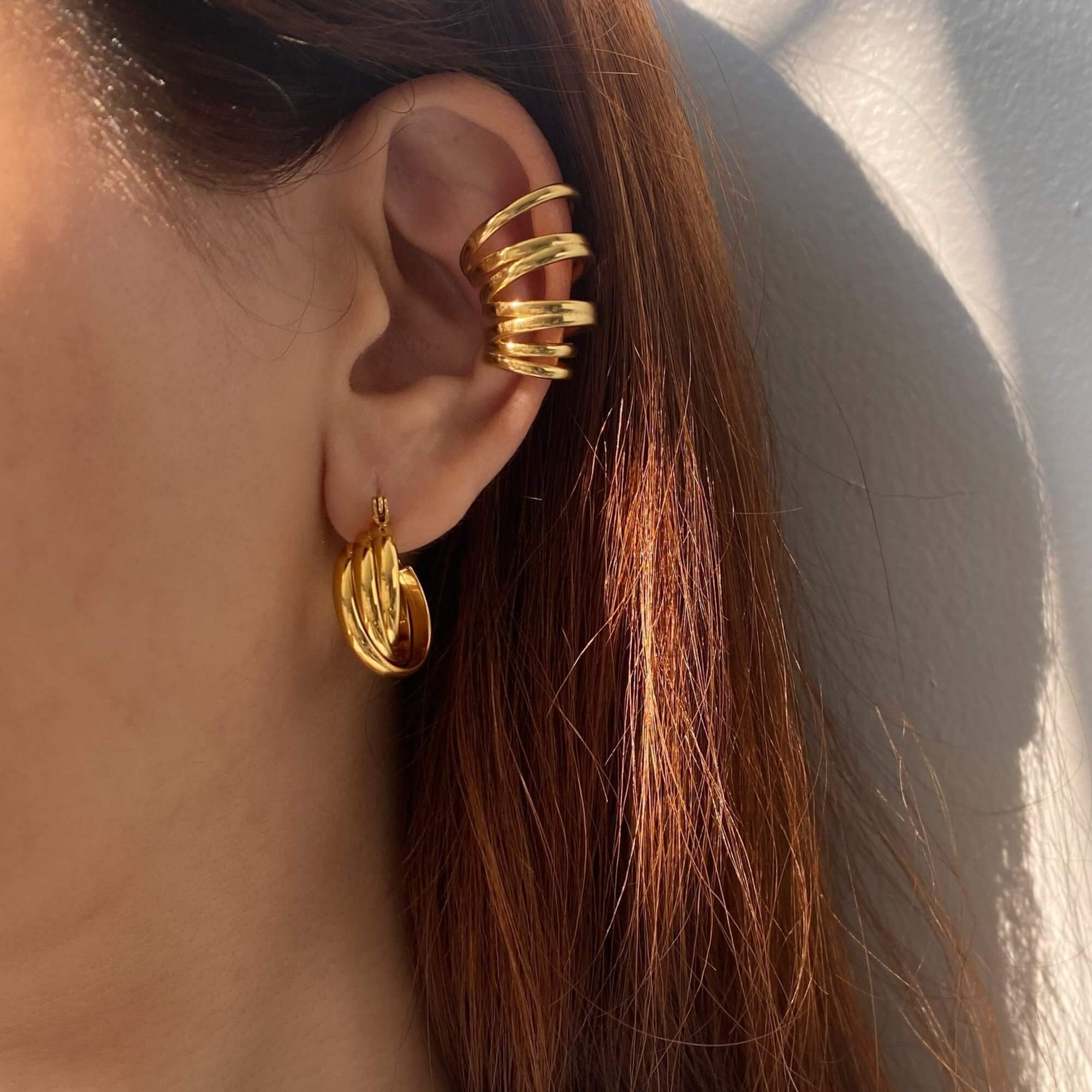Alternative worn view of the KanaE stacked hoop ear cuff by Kampy Designs, showcasing its secure fit and stylish stacked hoop design.