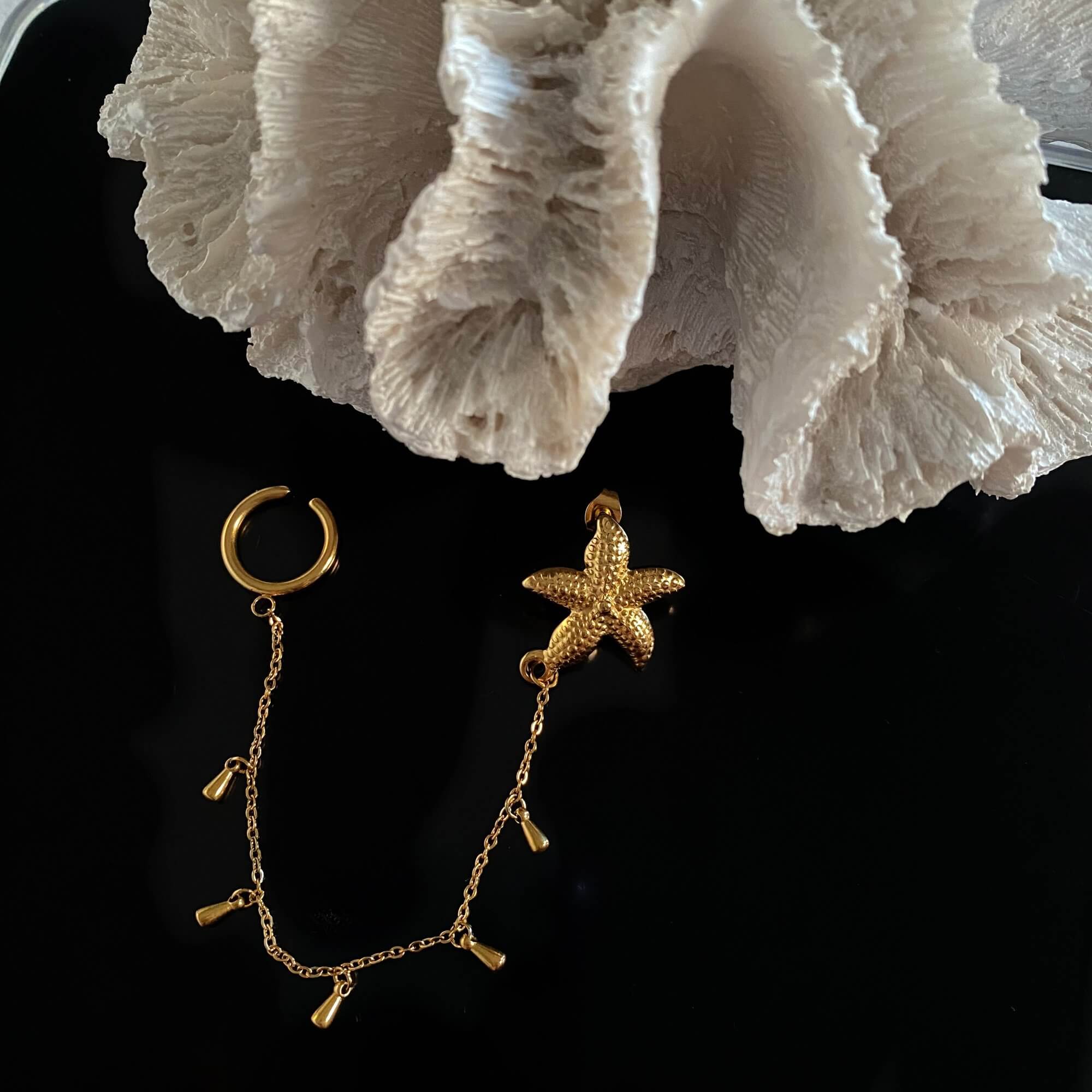 Front view of the KarlyE starfish chain cuff earrings by Kampy Designs, capturing their intricate design and ocean-inspired elegance.
