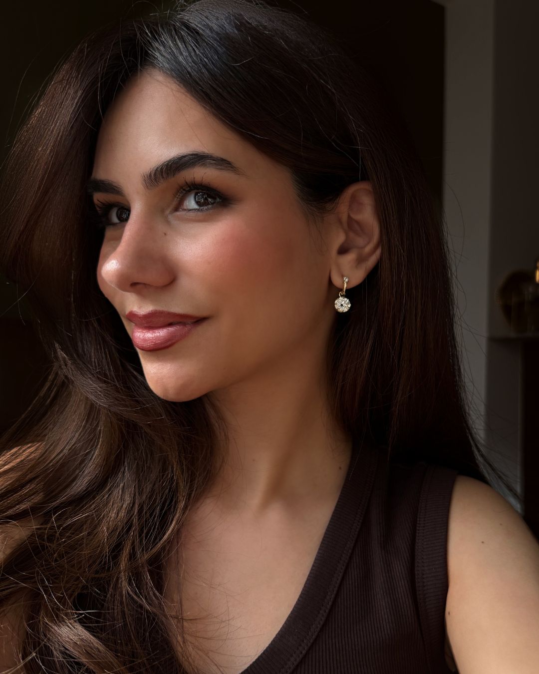 model wearing moissanite drop earrings
