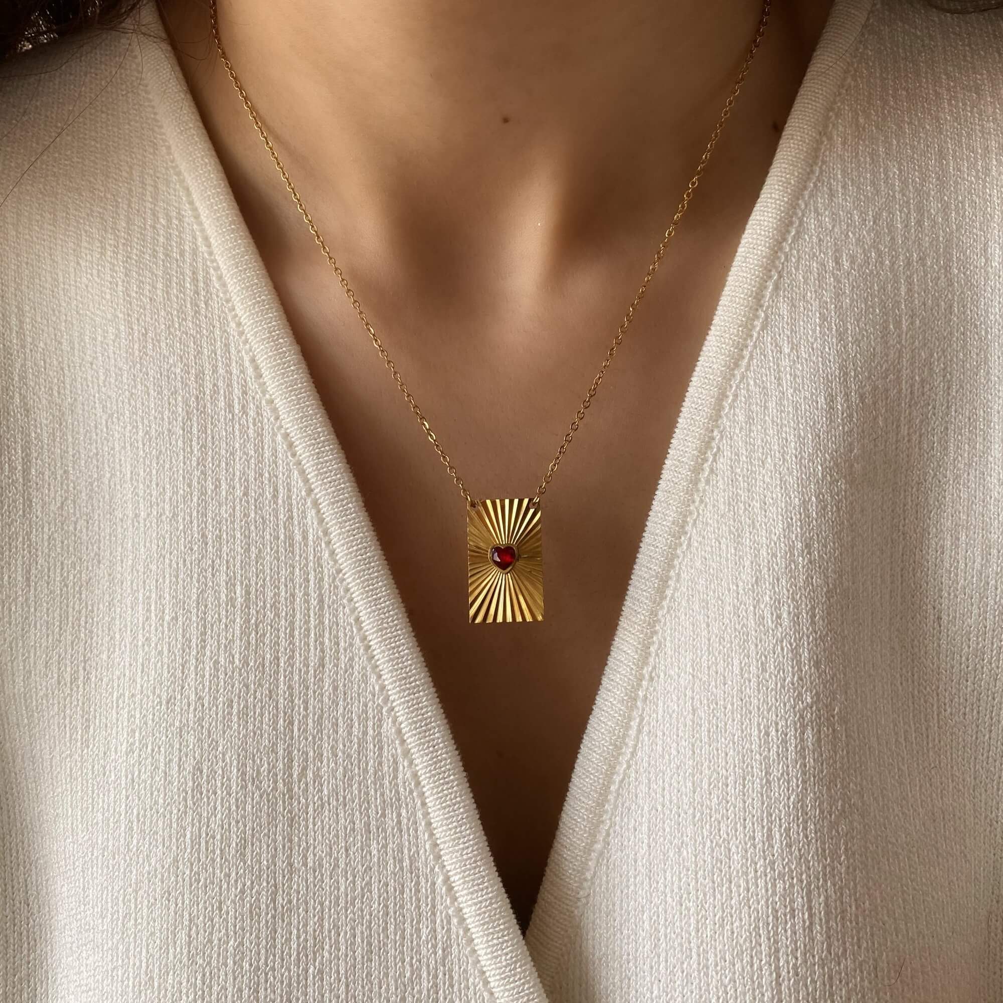 Front view of the KearyN sunburst rectangle heart pendant necklace by Kampy Designs, featuring a unique rectangular pendant with a delicate heart engraving.