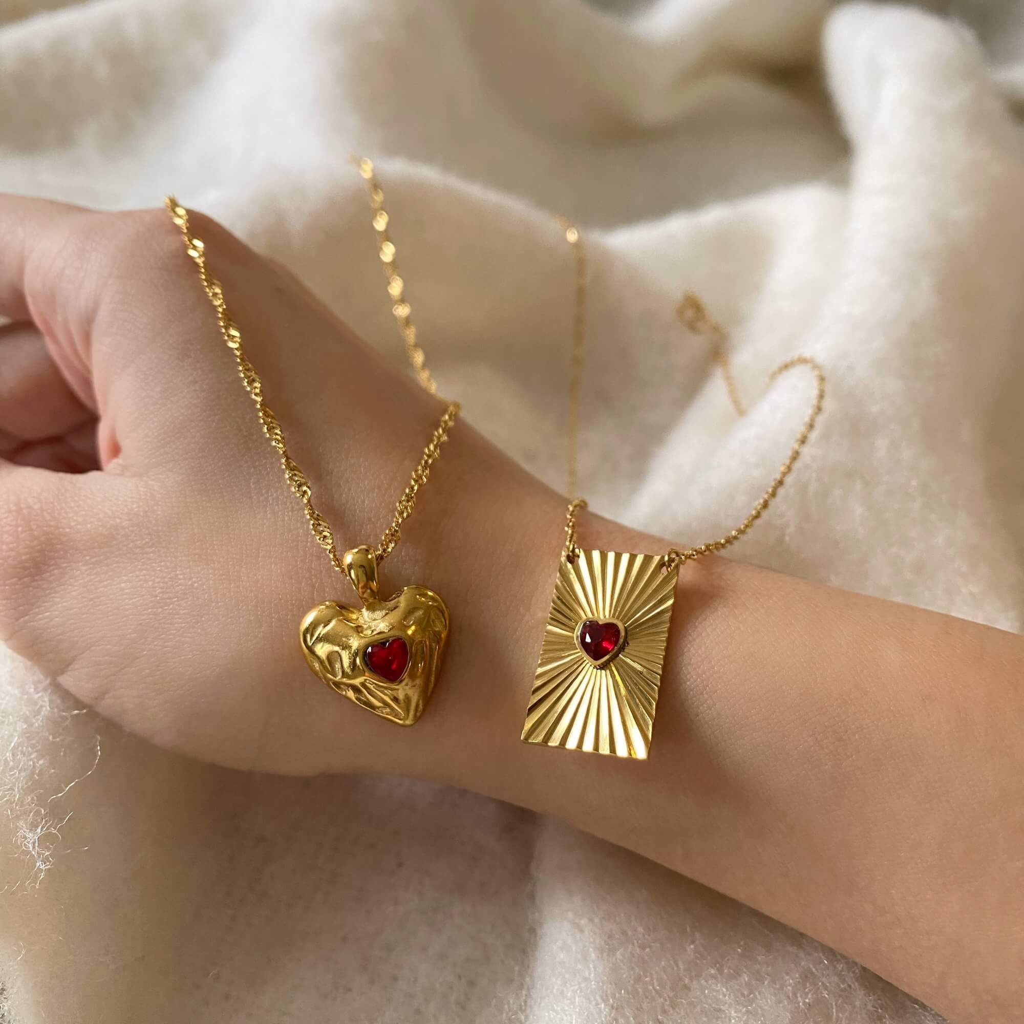 Stacked view of the KearyN sunburst rectangle heart pendant necklace by Kampy Designs, layered for a bold and stylish look.