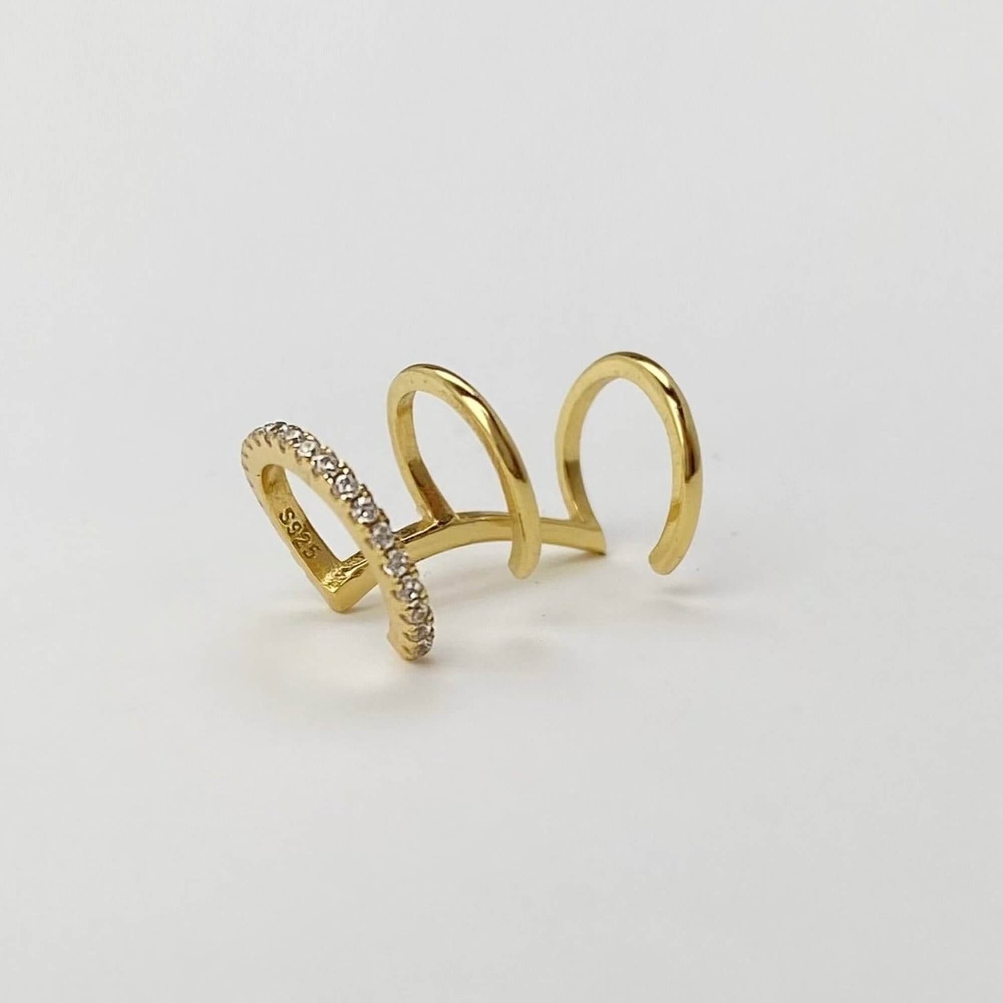 Front view of the KarlaE triple hoop CZ ear cuffs by Kampy Designs, highlighting their modern triple-band structure and sparkling cubic zirconia accents.