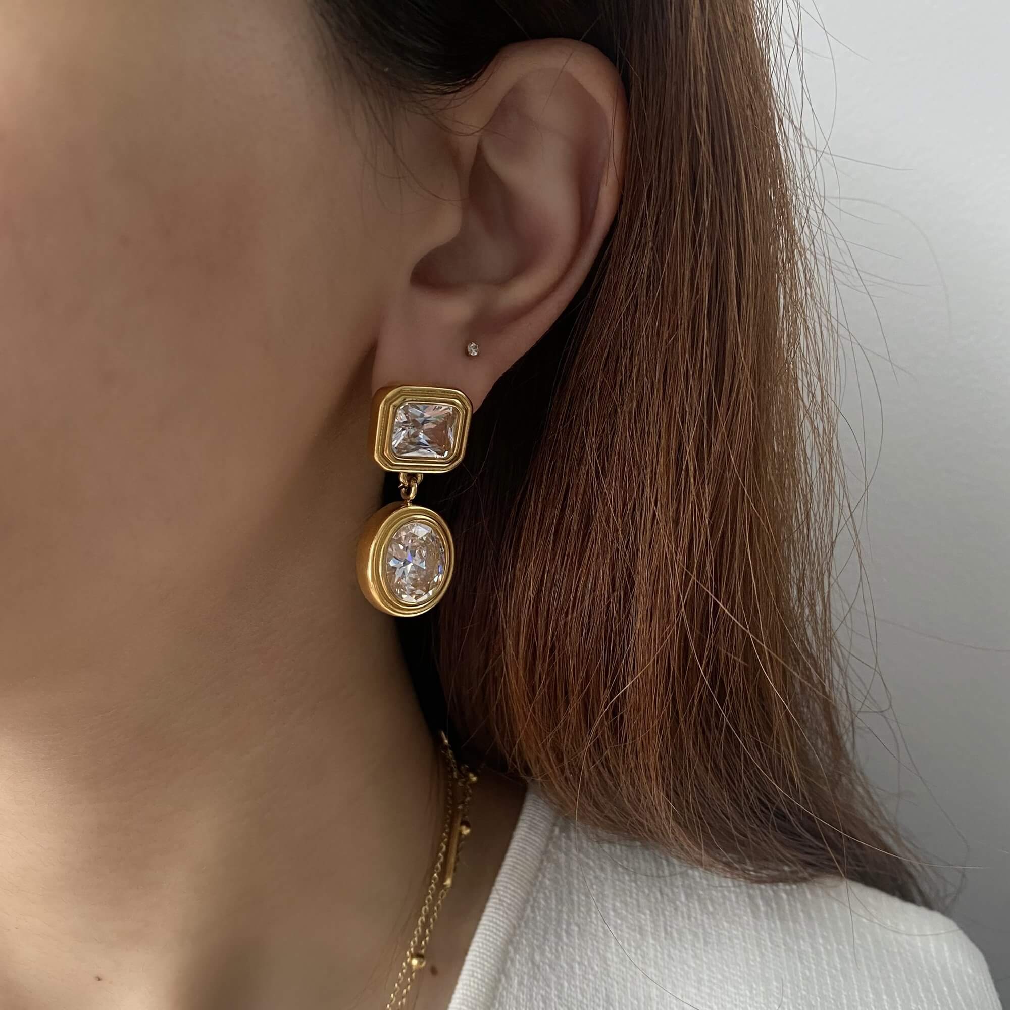 Standard flat lay of KosaE vintage-inspired dangle earrings by Kampy Designs, showing both earring sides and teardrop shape.