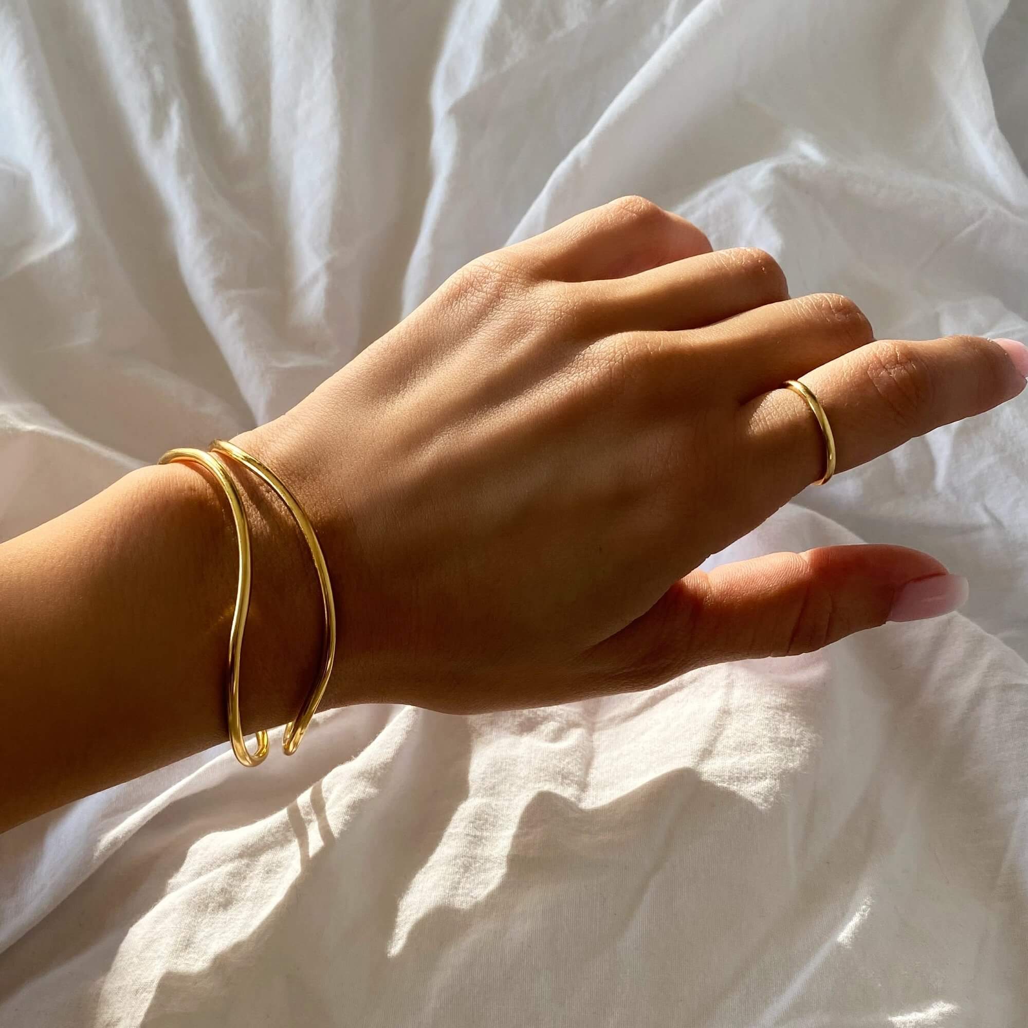 Close-up of the KohoB wave cuff bracelet by Kampy Designs, emphasizing its polished finish and unique wave-inspired design.