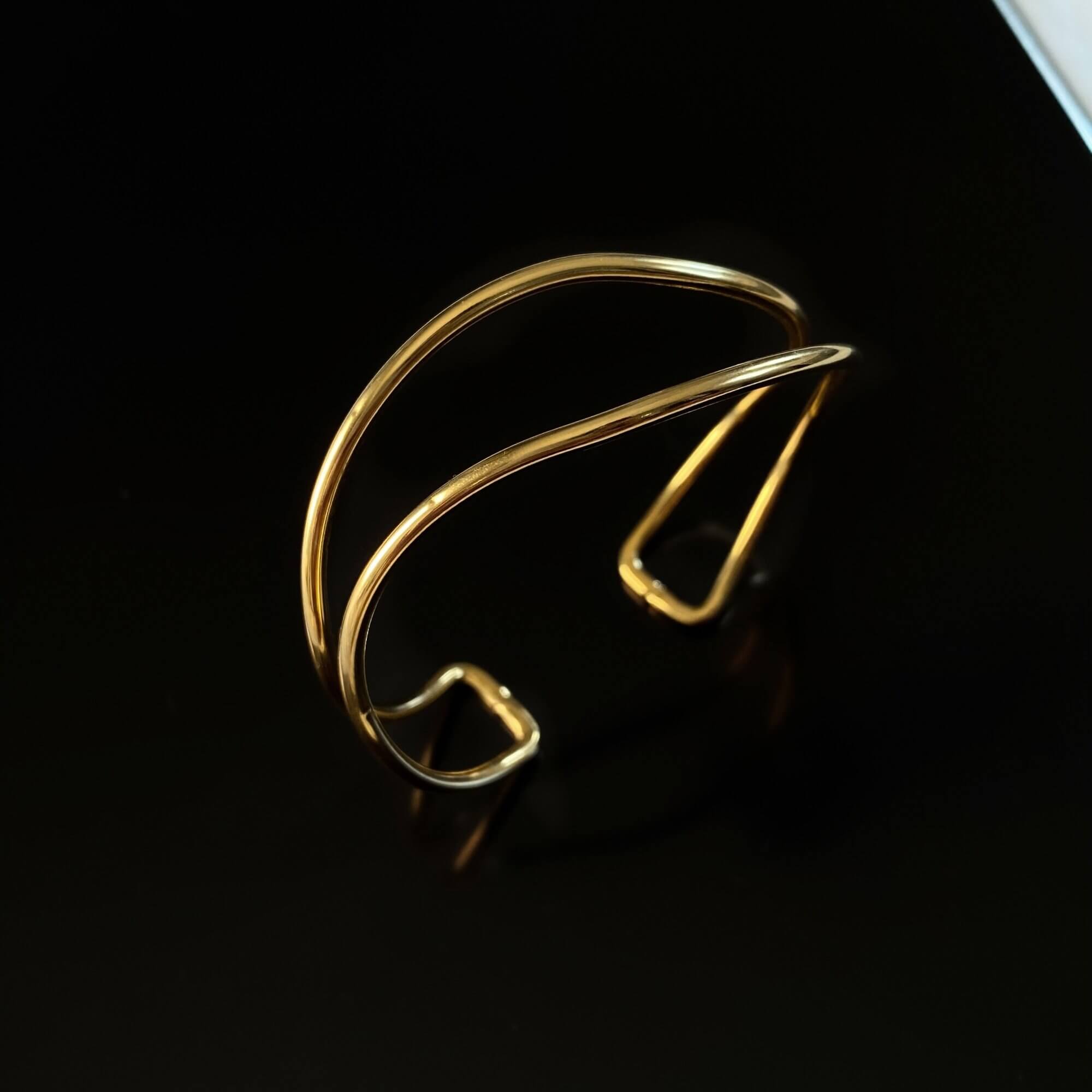 Front view of the KohoB wave cuff bracelet by Kampy Designs, displaying its bold yet sleek wave pattern.