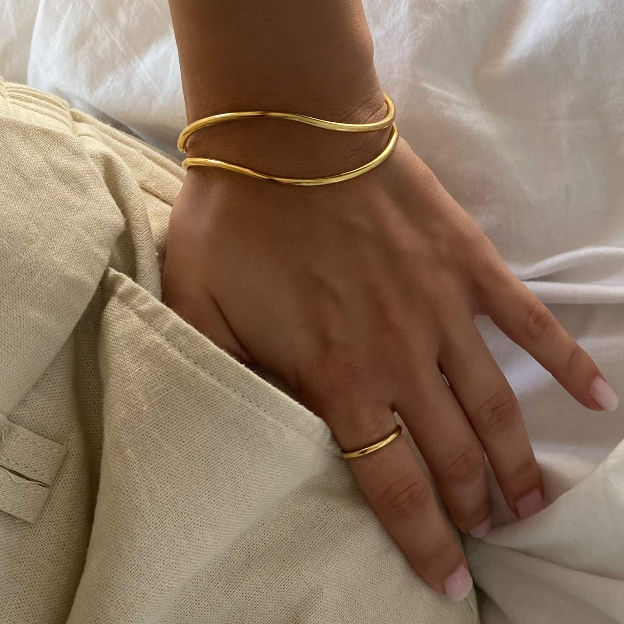 The KohoB wave cuff bracelet by Kampy Designs, styled elegantly to complement any modern jewelry collection.